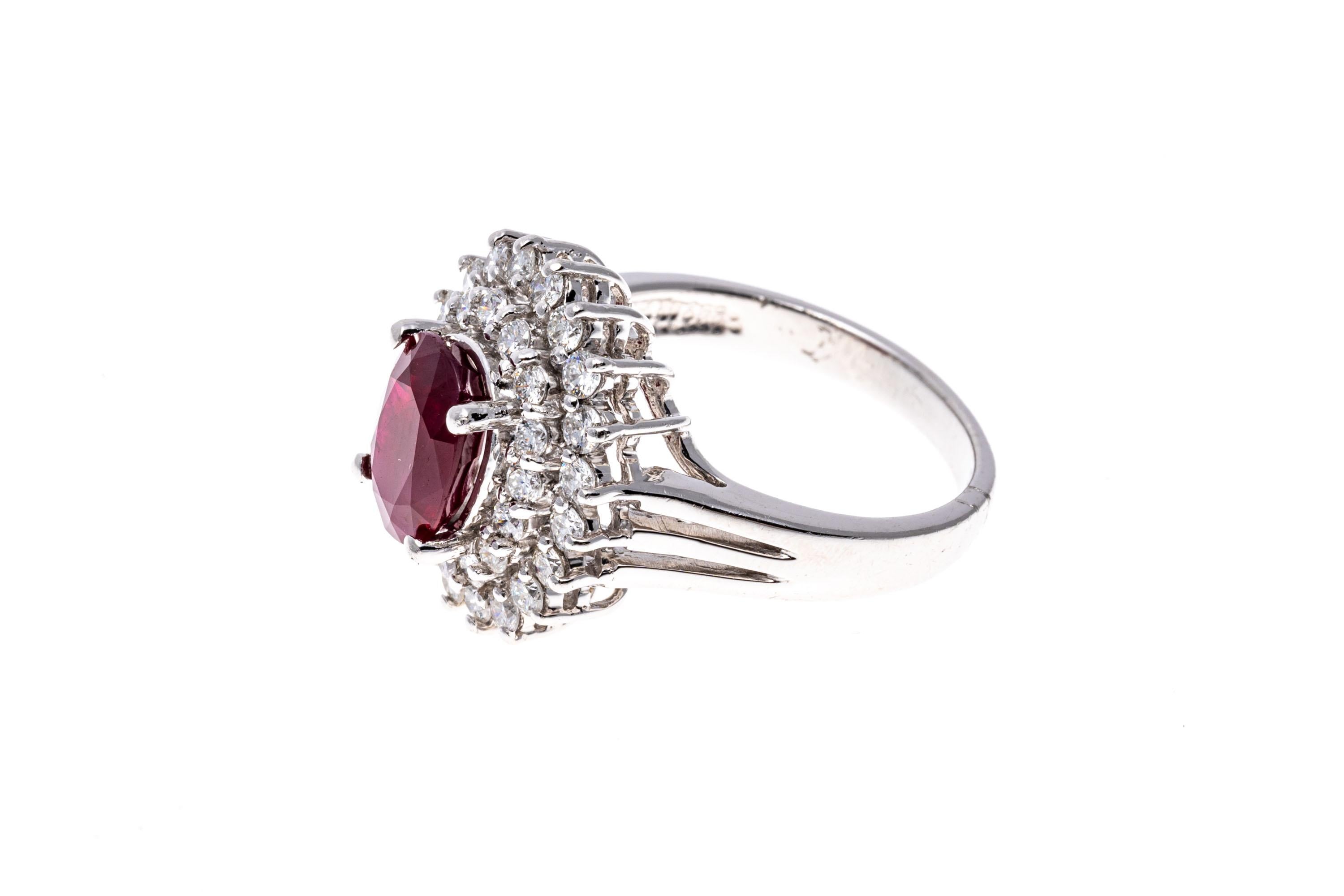 Women's Platinum, Ruby and Diamond Double Halo Cocktail Ring, App. 0.64 TCW For Sale