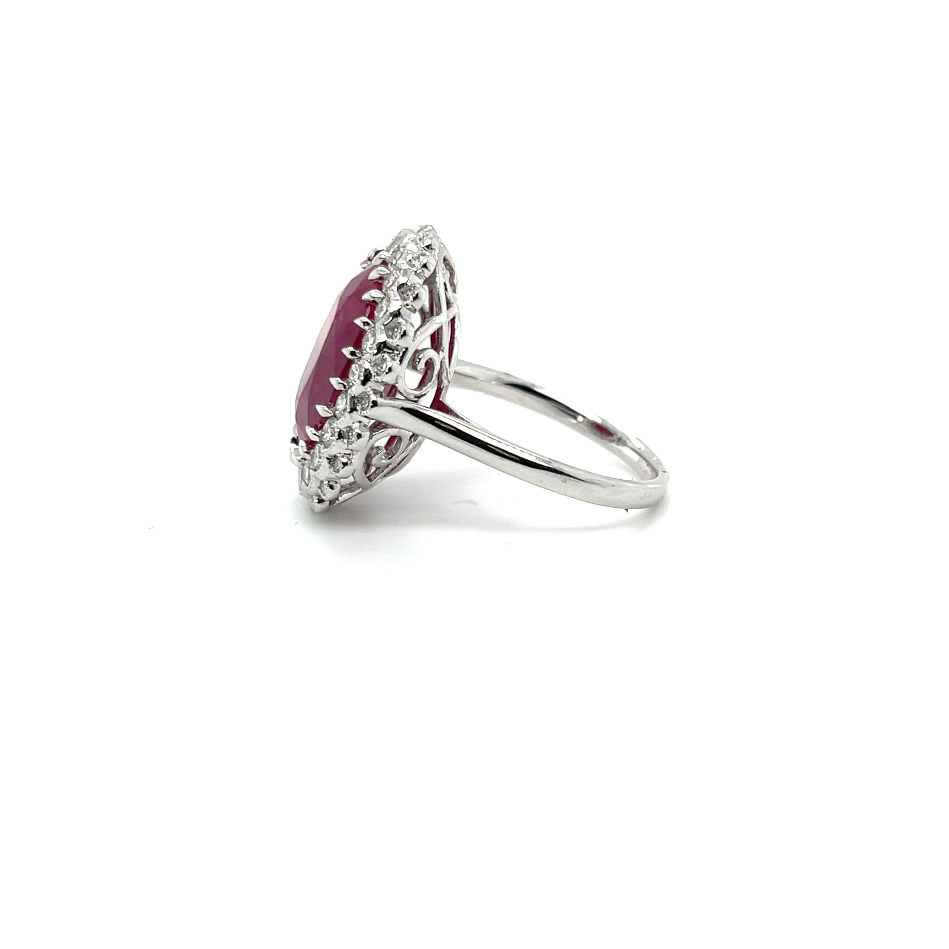 Gorgeous Ruby and Diamonds ring , beautifully crafted in platinum, featuring a double halo,  complimented by a gorgeous polished finish design. 

One ladies - platinum dress ring, narrow, half round shank with open back, multi-claw setting with