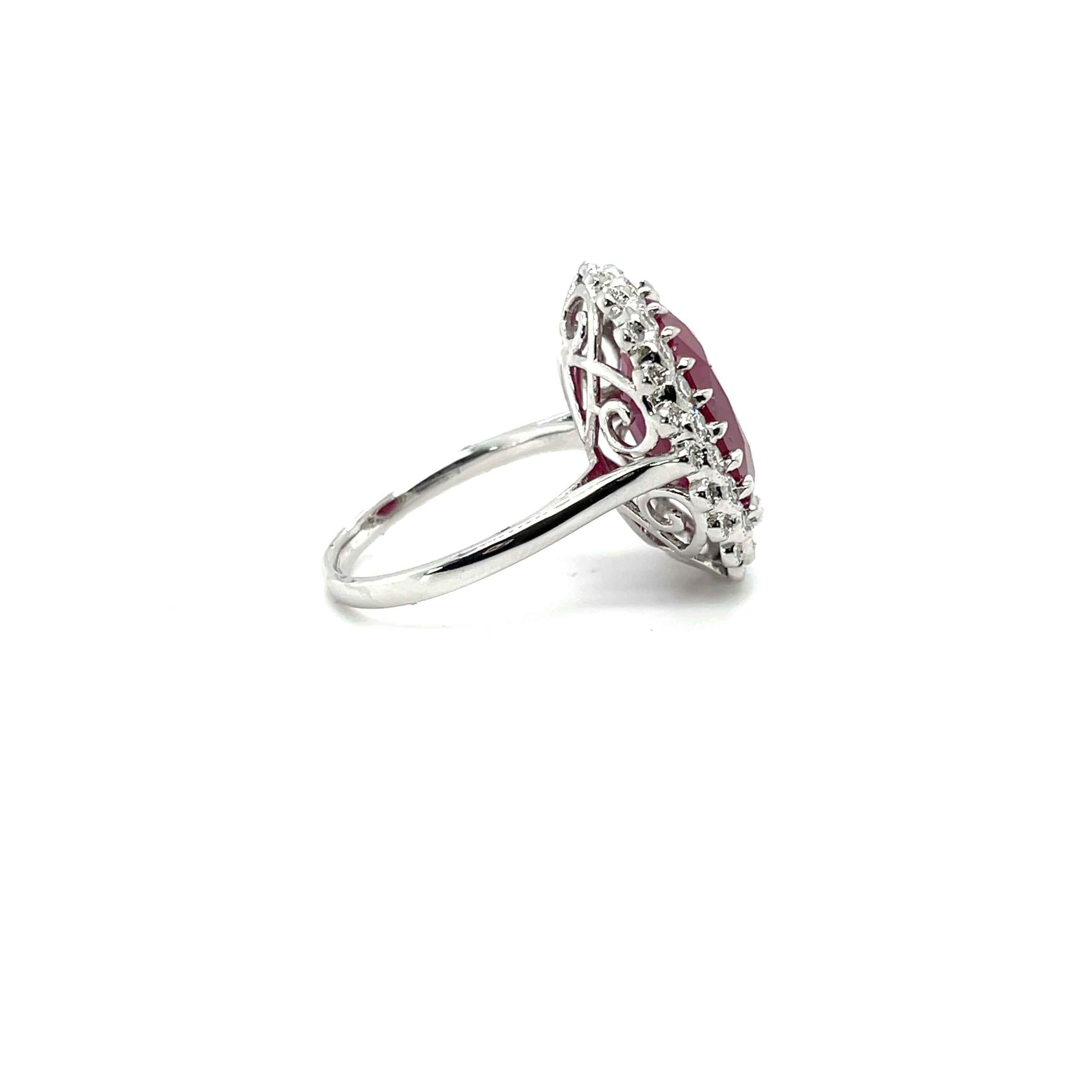 Contemporary Platinum Ruby and Diamond Double Halo Ring For Sale