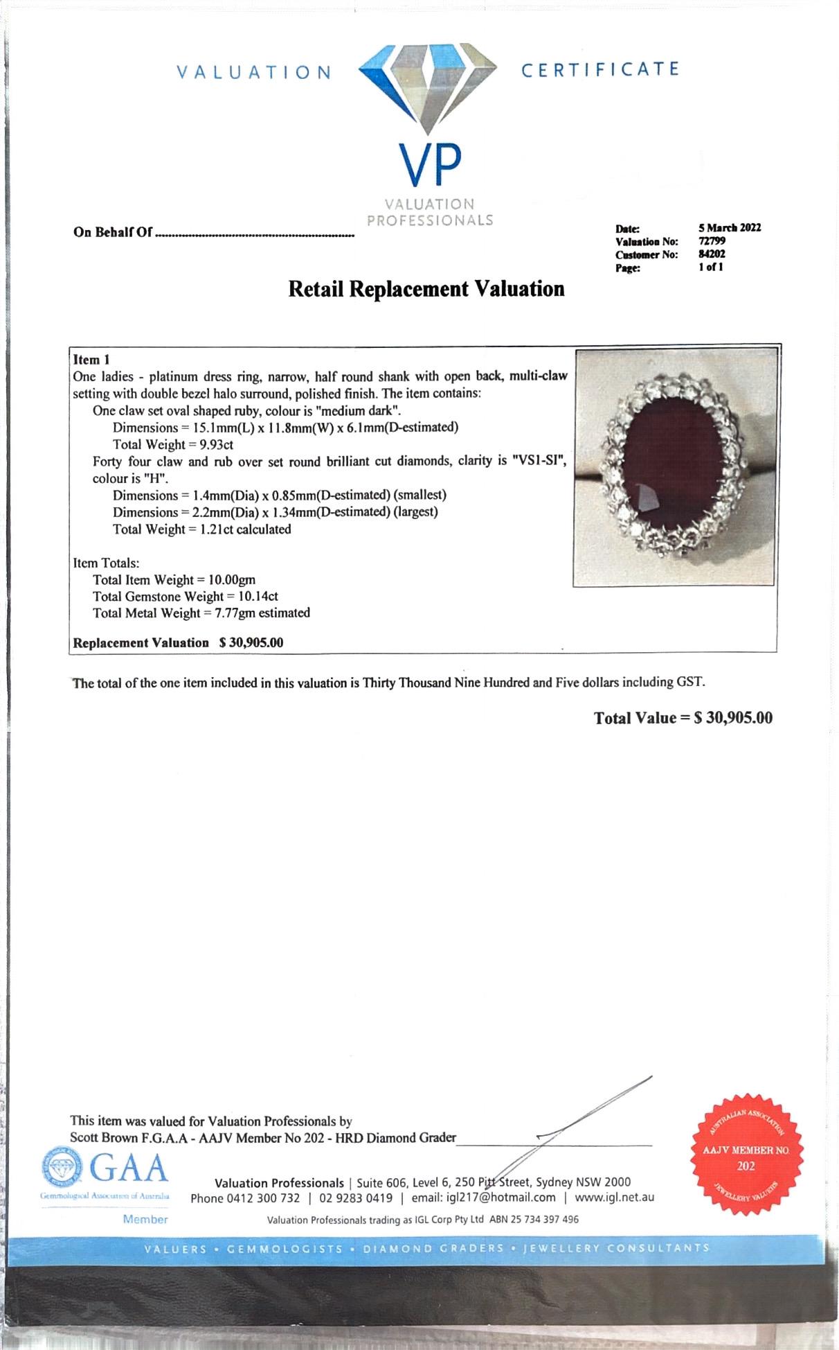 Platinum Ruby and Diamond Double Halo Ring In New Condition For Sale In Sydney, NSW