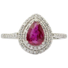 Platinum Ruby and Diamond Halo Engagement Ring