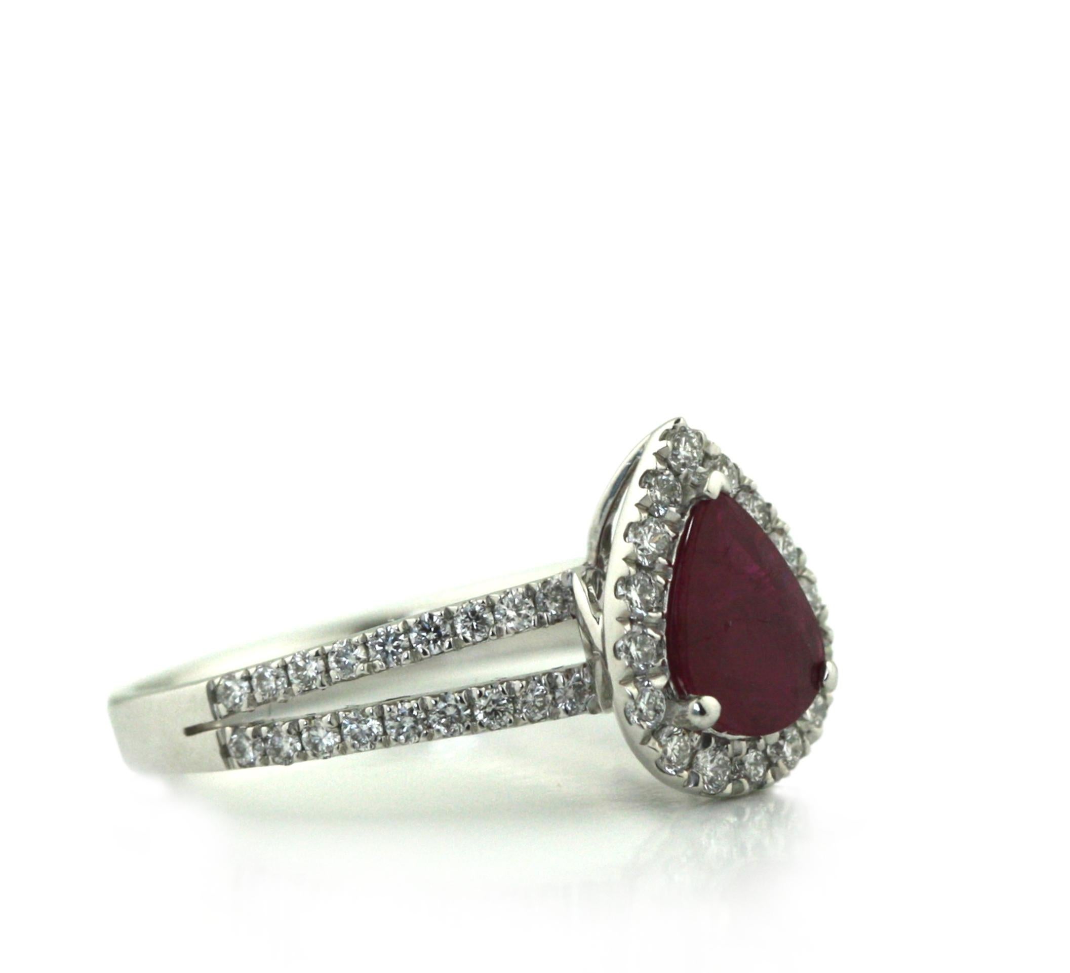 
Platinum Ruby and Diamond Ring
Featuring a Pear-shaped Purplish Red Ruby
Weighing 0.95 carats
Within a surround of 52 round, brilliant-cut diamonds total approximate weight 6.7 grams
Accompanied by GIA Report 2225075675 dated October 15, 2021