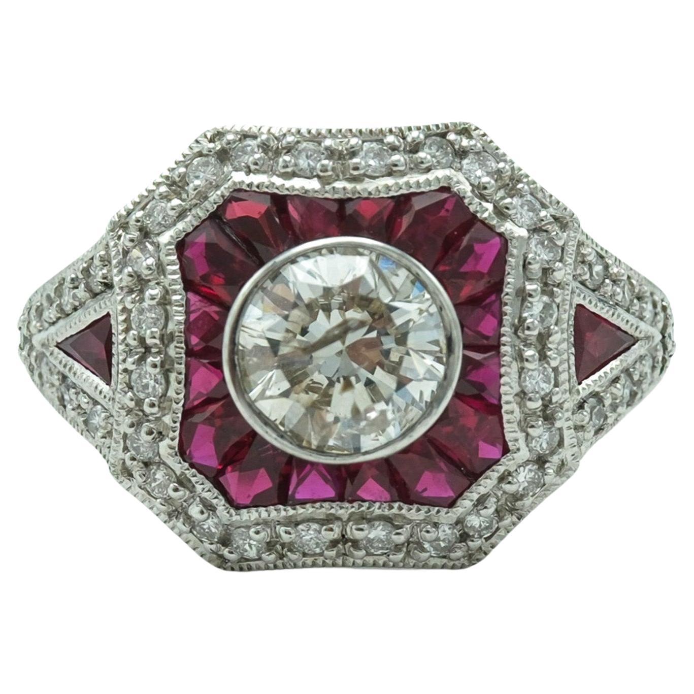 Platin-Ring mit Rubin und Diamanten im Baguetteschliff und runden Diamanten