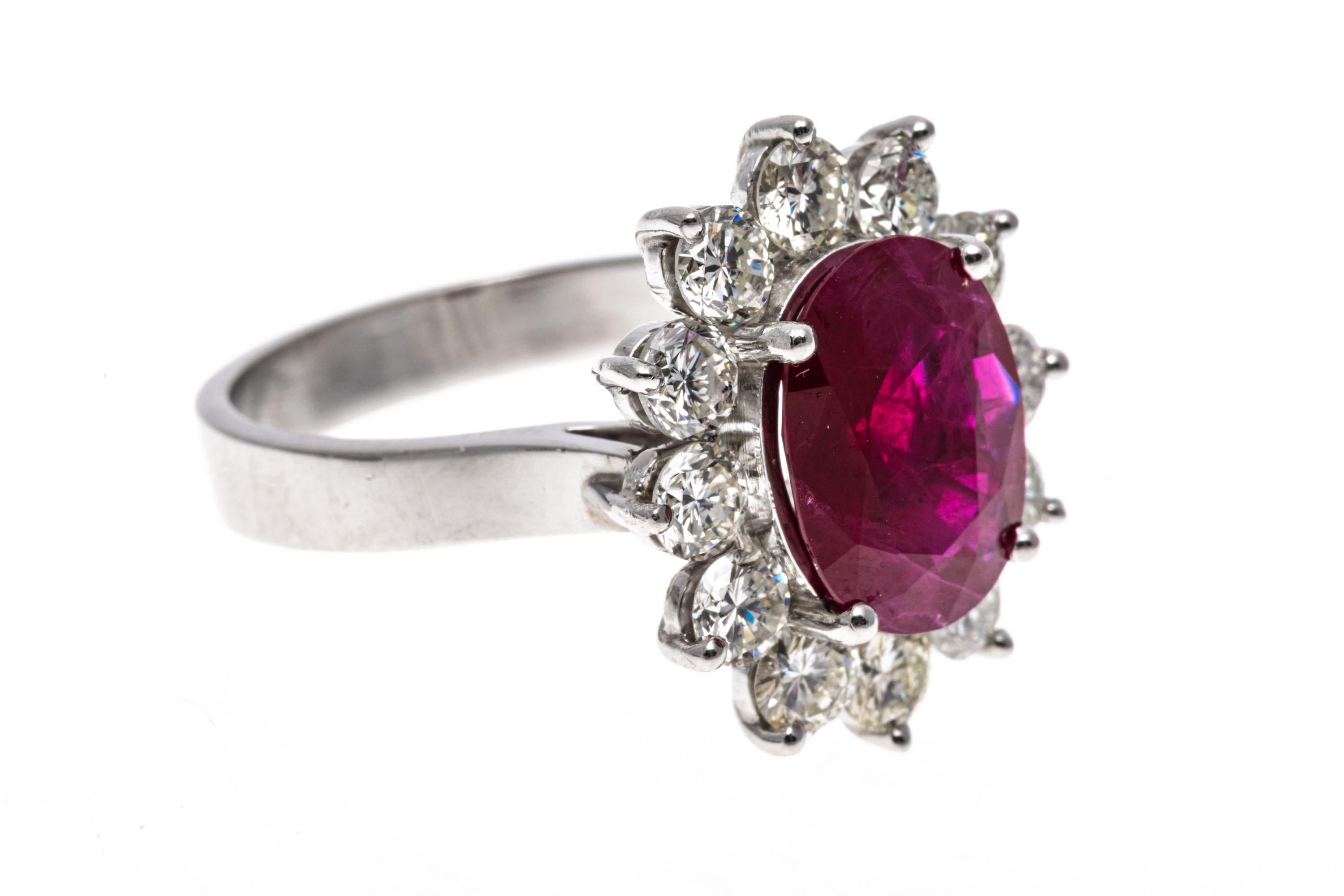 Platinum Oval Ruby and Round Brilliant Diamond Halo Ring, App. 0.96 TCW In Good Condition For Sale In Southport, CT