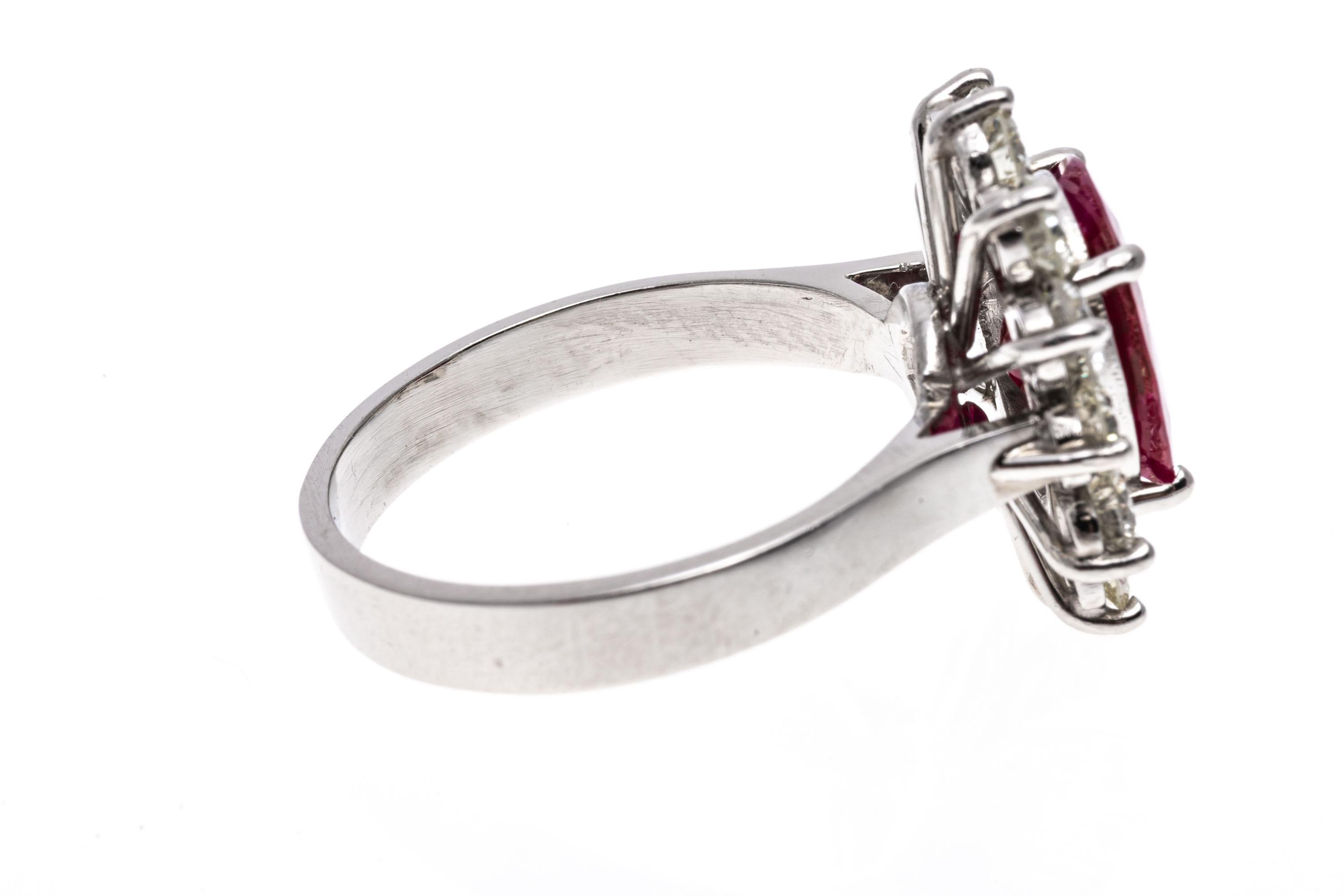 Platinum Oval Ruby and Round Brilliant Diamond Halo Ring, App. 0.96 TCW For Sale 1