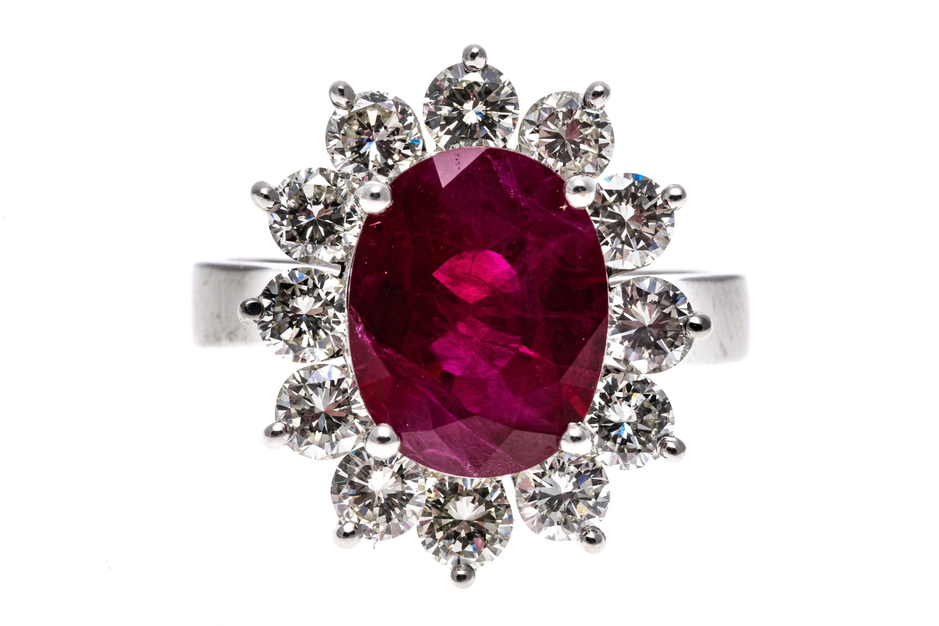 Platinum Oval Ruby and Round Brilliant Diamond Halo Ring, App. 0.96 TCW For Sale 2