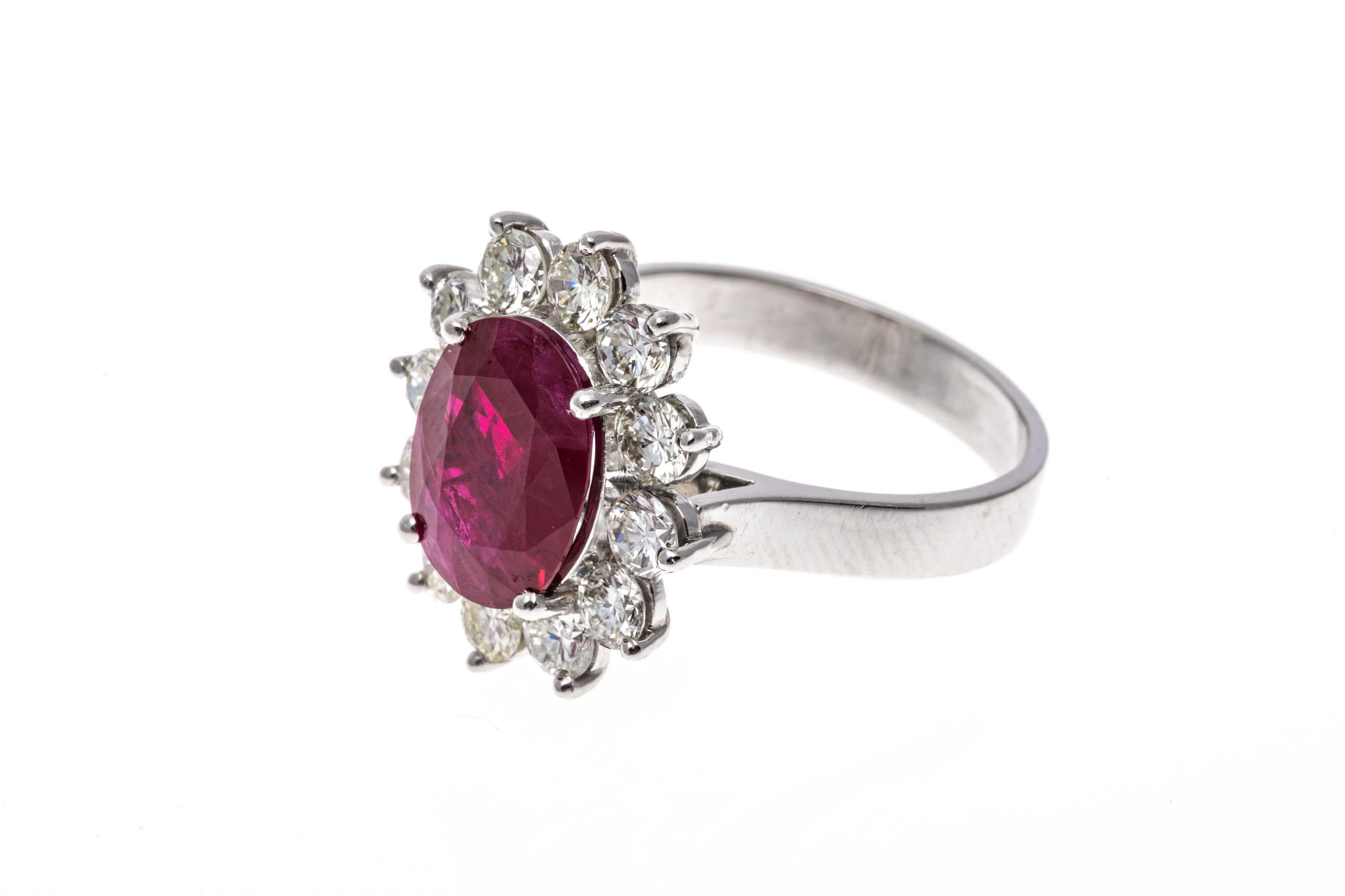 Platinum Oval Ruby and Round Brilliant Diamond Halo Ring, App. 0.96 TCW For Sale 3