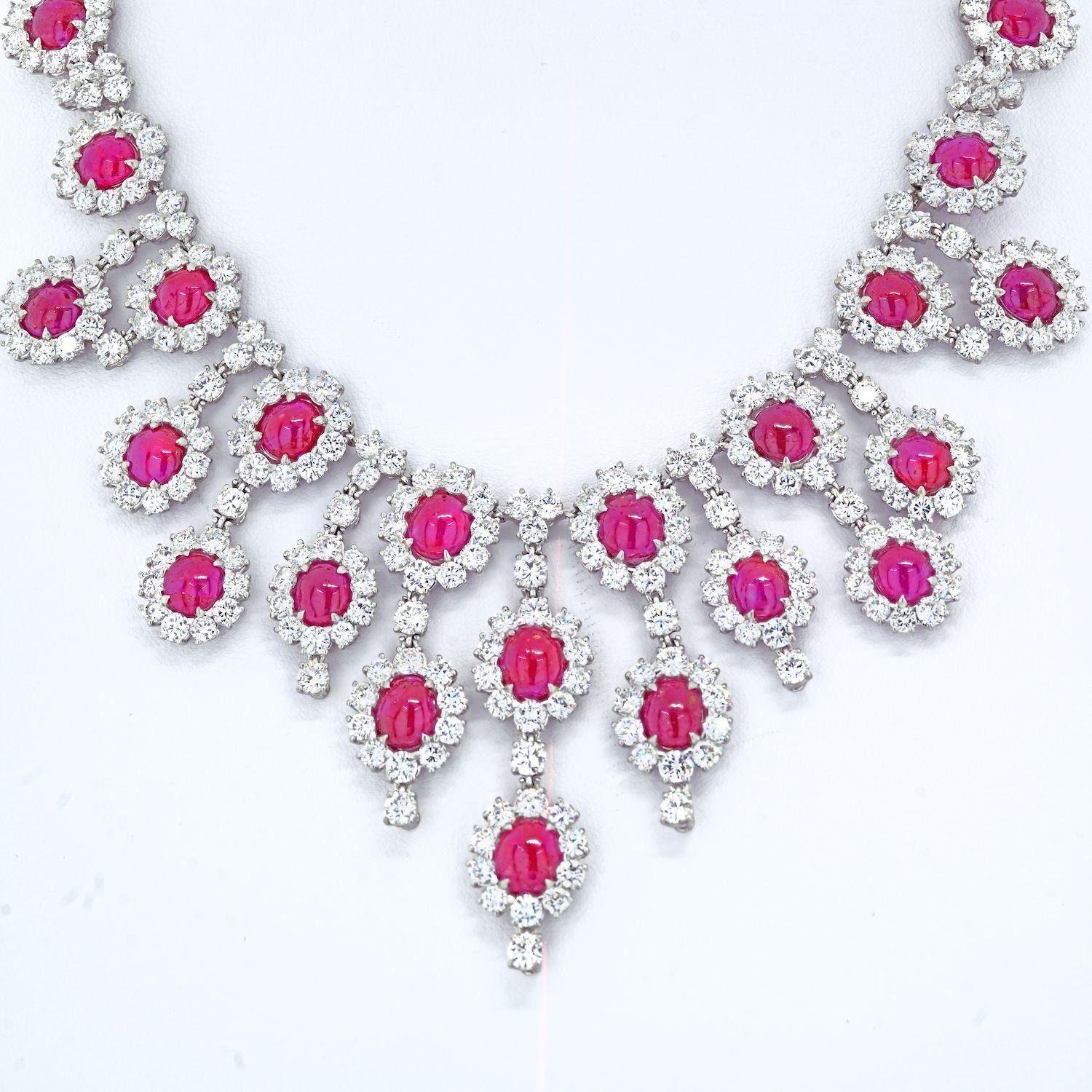 Platinum ruby and diamond chandelier necklace with 24 oval cut rubies and brilliant and brilliant cut diamonds. 
Lord of the gemstones or king of all precious stones, rubies have carved up their way to prominence in every culture in the world. Ruby