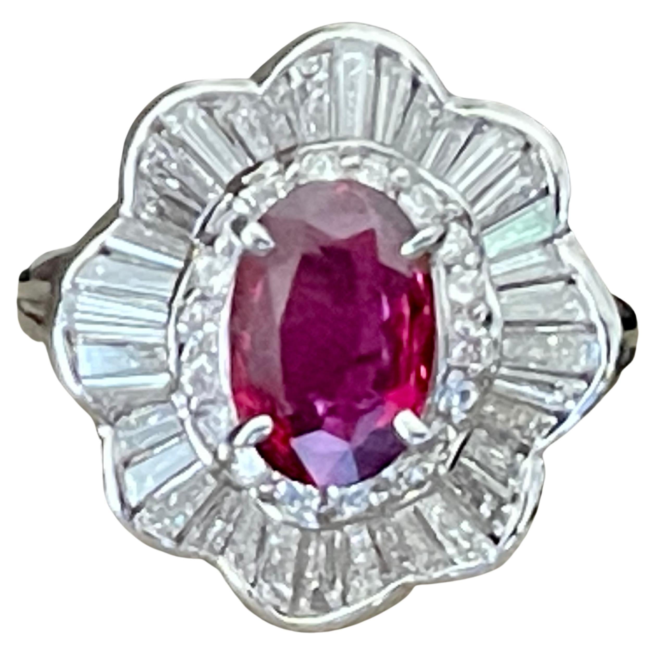 Anello Entourage in platino con diamante e rubino