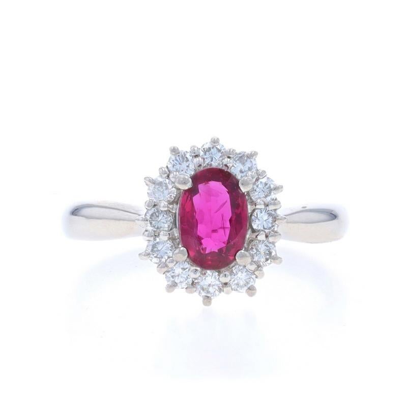 Size: 6 1/4
Sizing Fee: Up 2 1/2 sizes for $60 or Down 1 1/2 sizes for $40

Metal Content: 850 Platinum

Stone Information

Natural Ruby
Treatment: Heating
Carat(s): .70ct
Cut: Oval
Color: Oval
Clarity: Pinkish Red

Natural Diamonds
Carat(s):