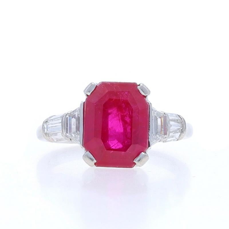 Size: 4 1/2
Note: Please contact us for a resizing quote.

Metal Content: 900 Platinum

Stone Information
Natural Ruby
Treatment: No Heat, Untreated
Carat(s): 3.91ct
Cut: Emerald
Color: Pinkish Red
Origin: Burma
Certified by: AGL
Report Number: