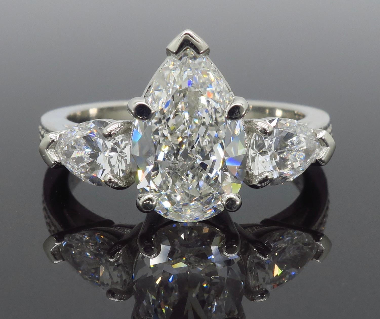 platinum pear engagement rings