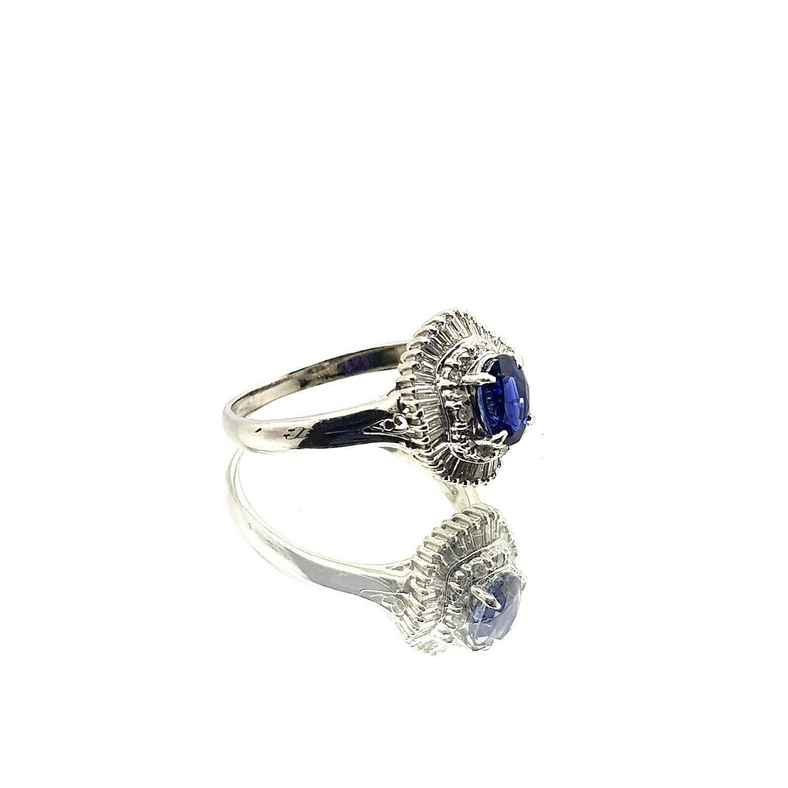  This is beautiful platinum ring with nice intence blue sapphire and diamonds. It looks very elegant on the hand. The current ring size is 7.25US, but it can be resized. 
Specifications:
    main stone: BLUE SAPPHIRE  0.90 ct
    additional: ROUND