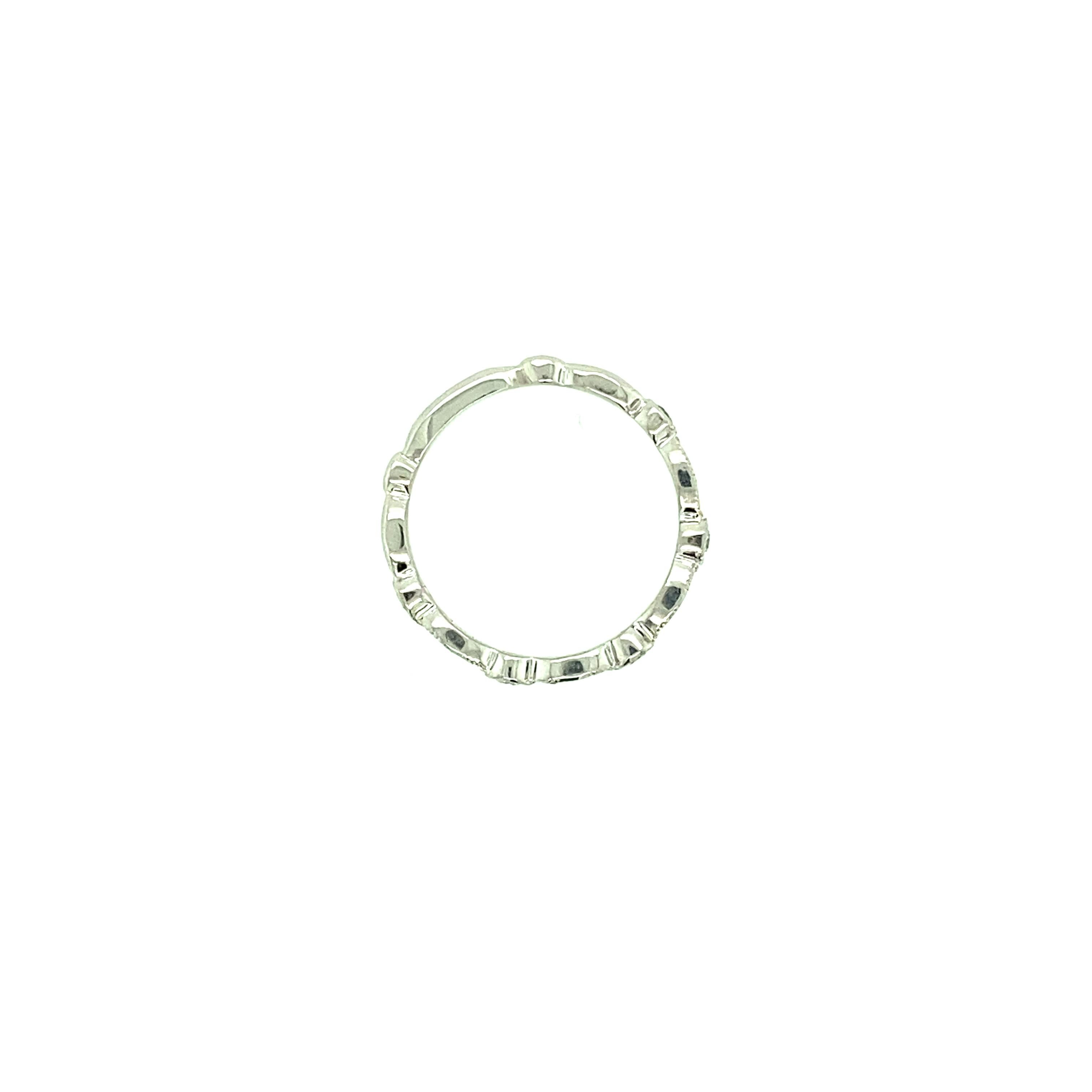 Contemporary Platinum Sapphire and Diamond Band