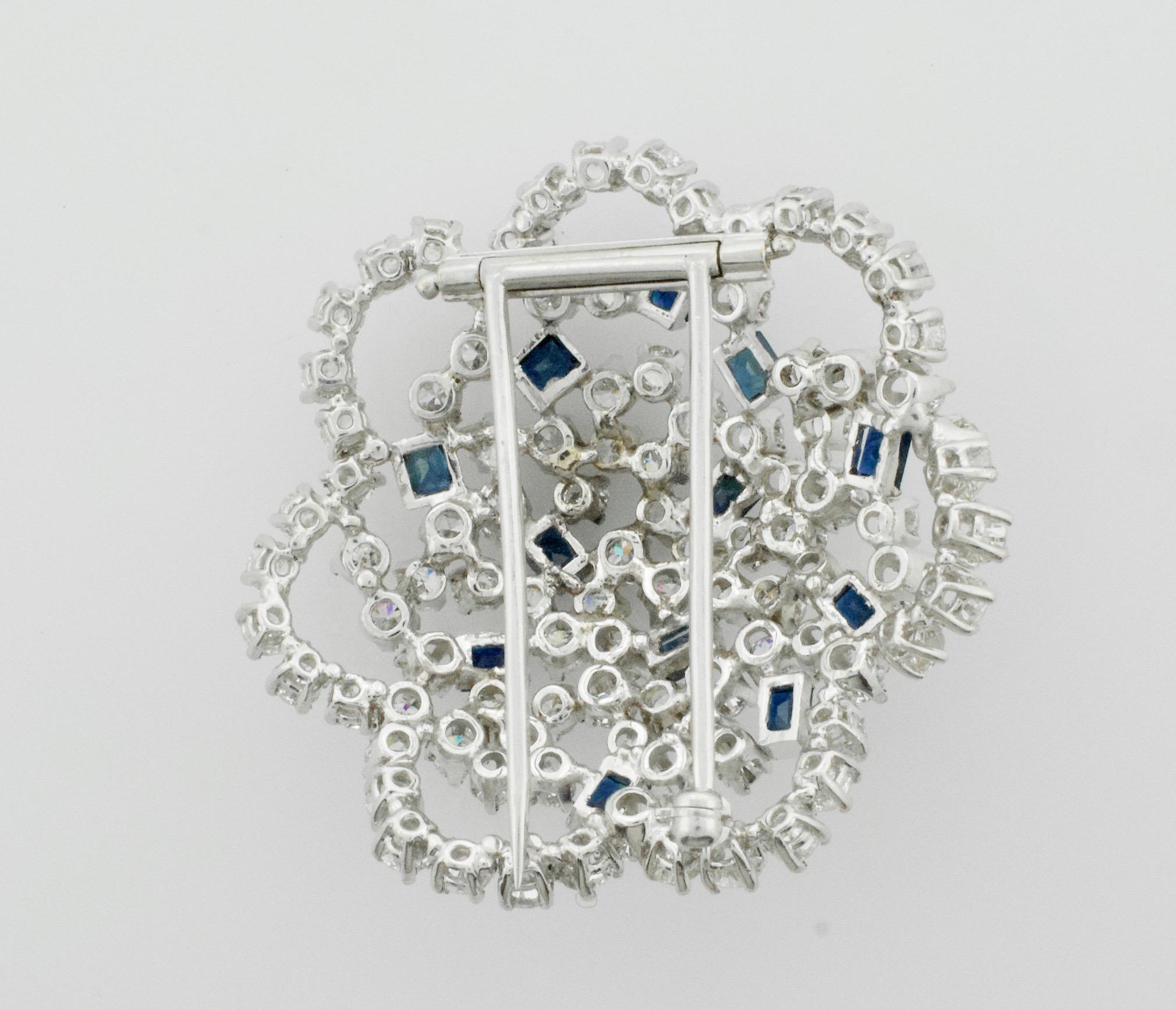 Platinum Sapphire and Diamond Brooch Circa 1950's 9.25 carats 
Weighing in at Just Shy of Ten carats  This Brooch Will Make a Statement For a Lifetime
Ninety Six Round Brilliant Cut Diamonds weighing 9.25 carats approximately [GHI Si1]
Twelve French