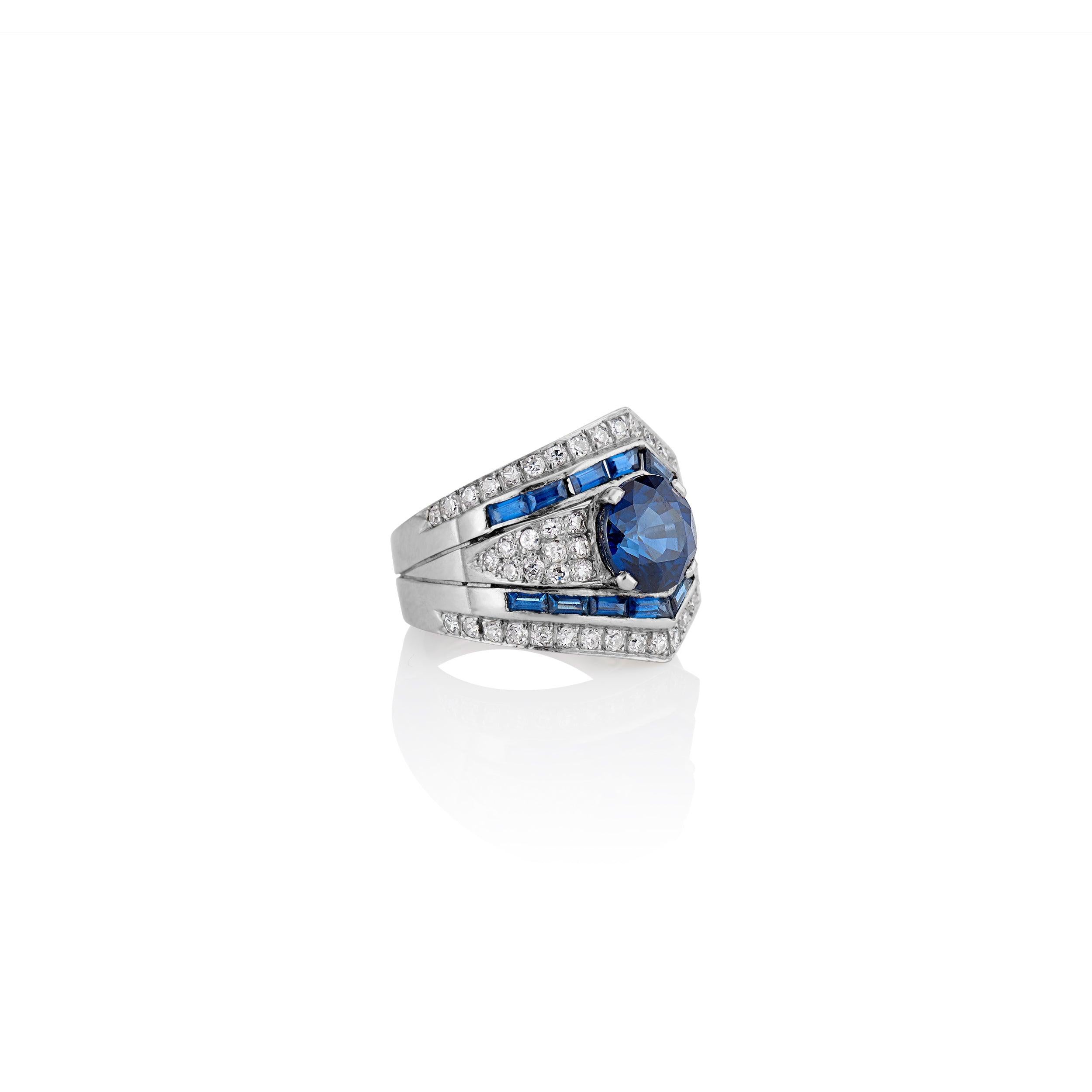 Round Cut Platinum Sapphire and Diamond Buckle Ring For Sale