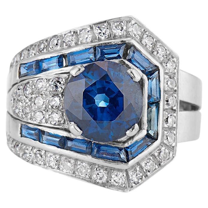Platinum Sapphire and Diamond Buckle Ring For Sale