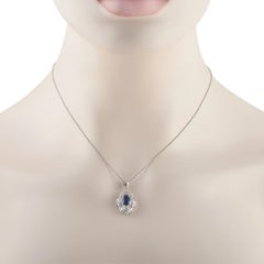 Halskette mit Anhänger aus Platin, Saphir und Diamanten im Doppel-Halo-Design MF03-062326