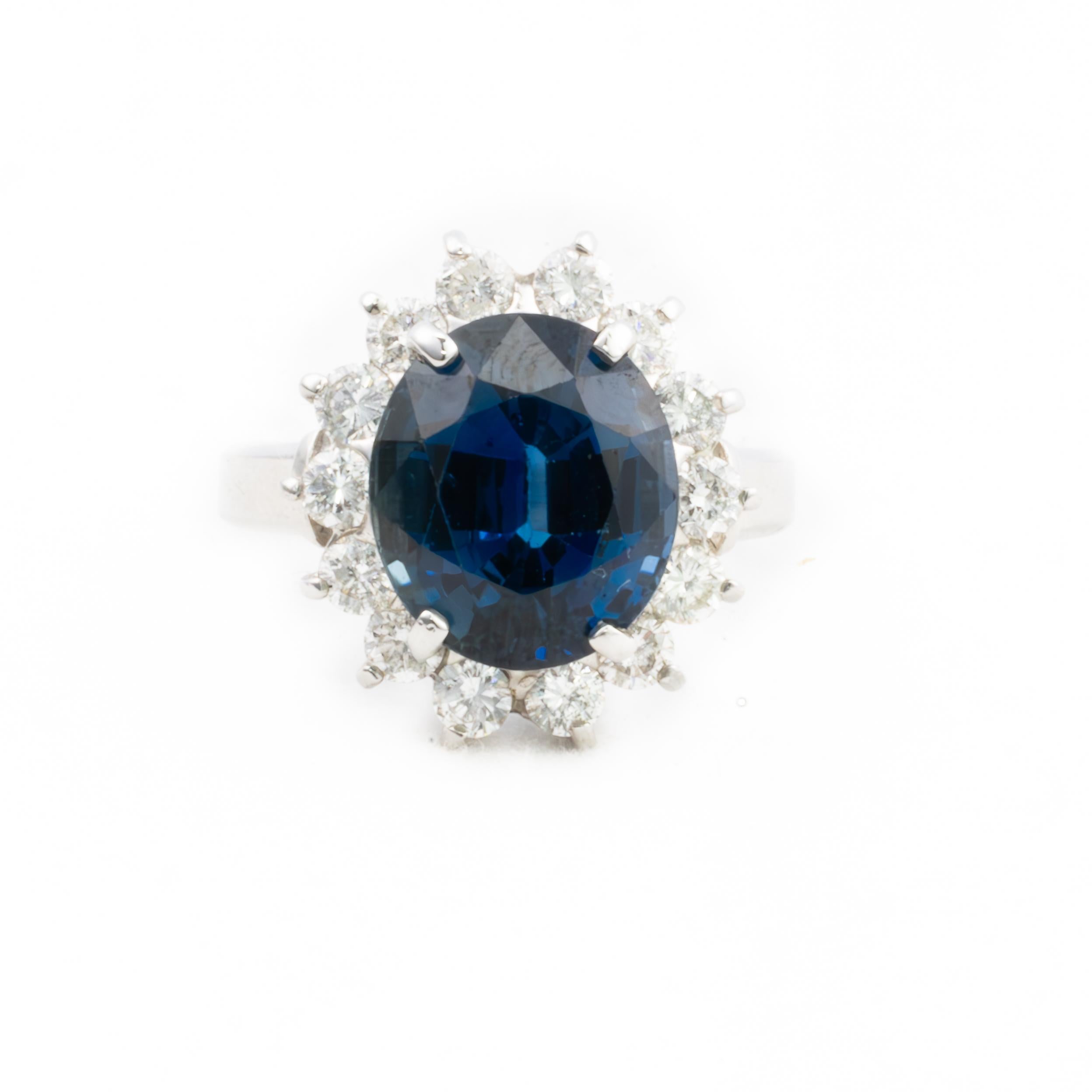 in vendita:  Anello aureola in platino con zaffiro e diamante 2