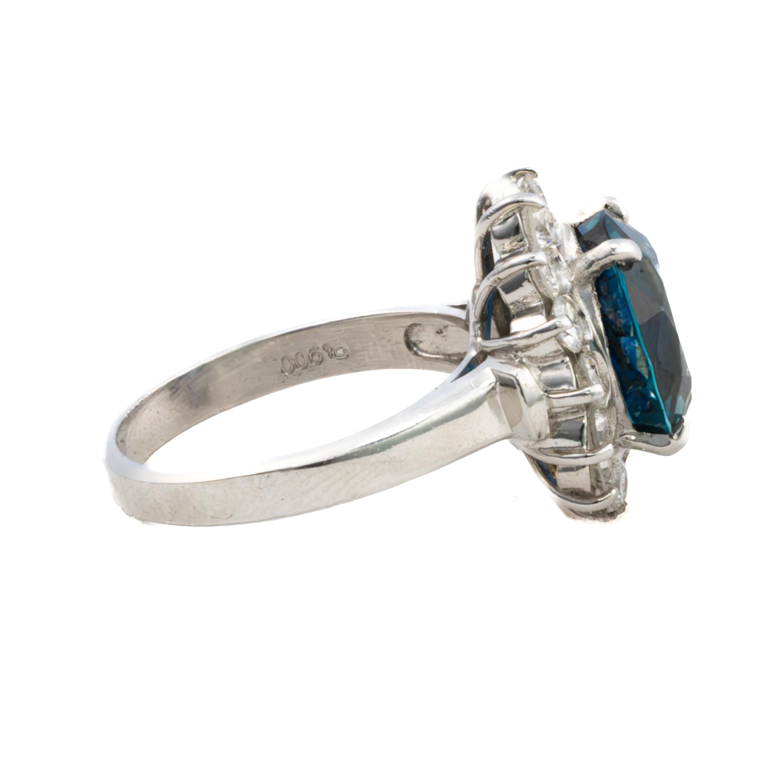in vendita:  Anello aureola in platino con zaffiro e diamante 4