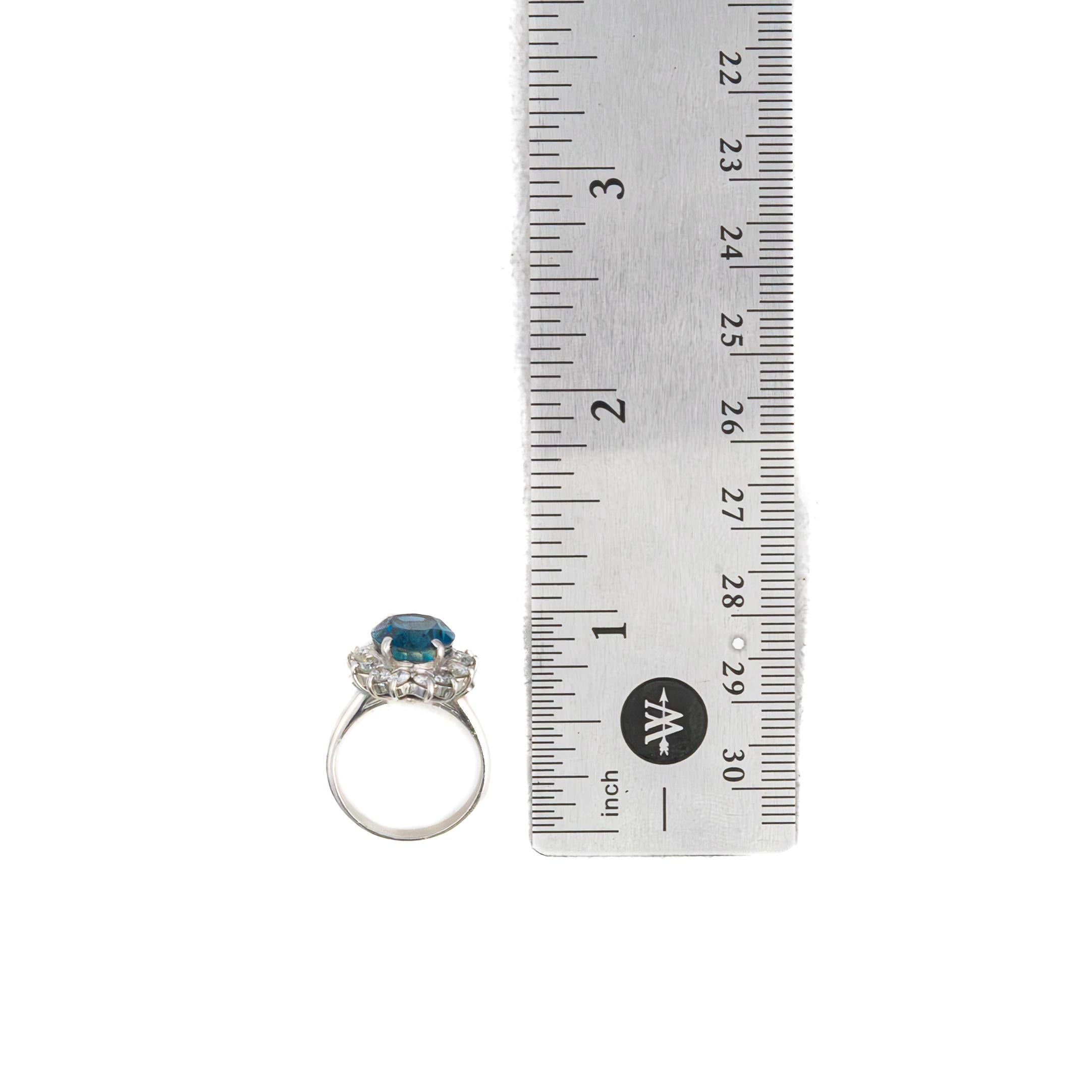 in vendita:  Anello aureola in platino con zaffiro e diamante 6