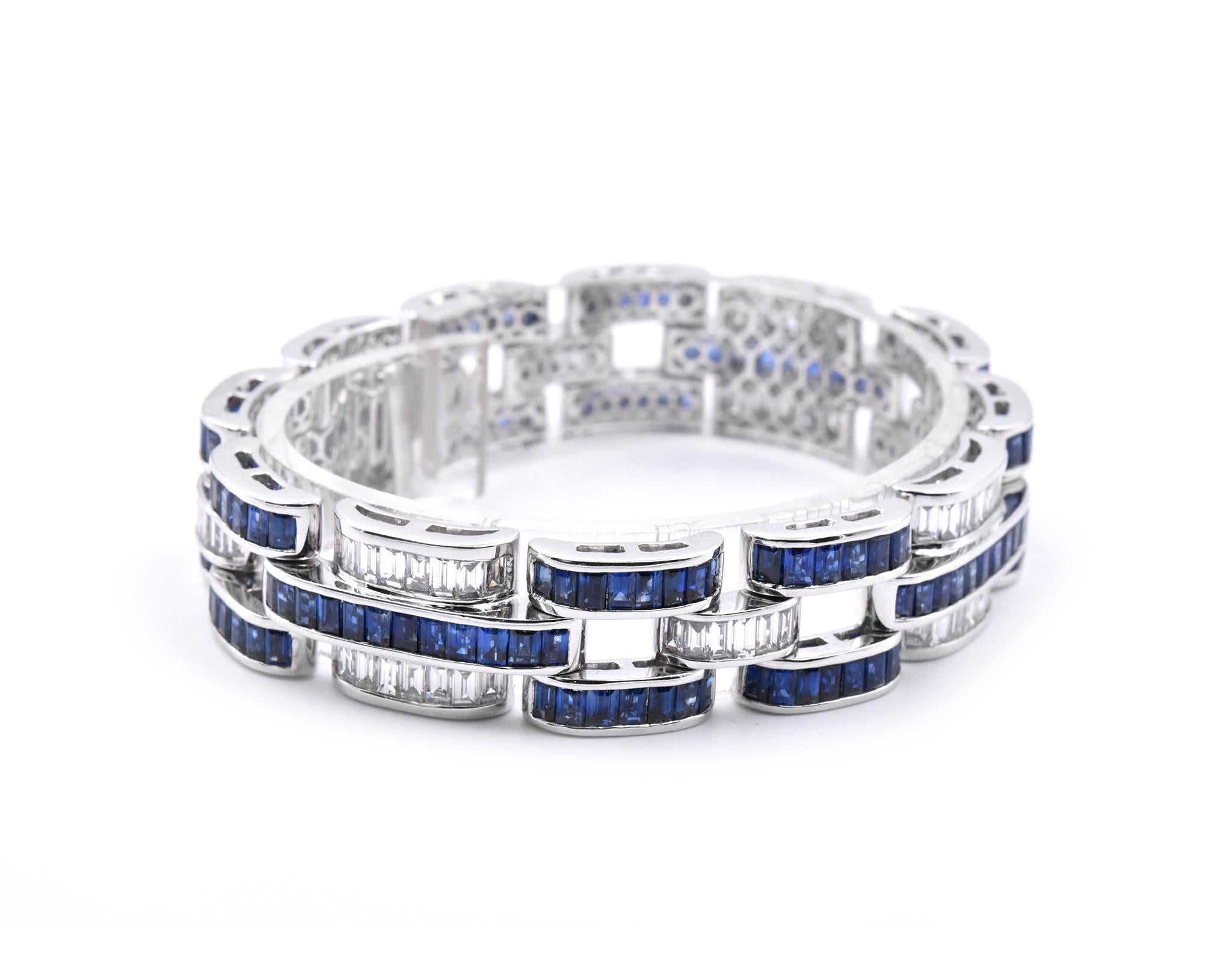 Material: platinum
Sapphire: 164 baguette cut sapphires = 16.83cttw
Diamonds: 92 baguette cut diamonds = 5.74cttw
Color: G-H
Clarity: VS
Dimensions: bracelet will fit a 7-inch wrist, measures 12.80mm in width
Weight: 67.20 grams