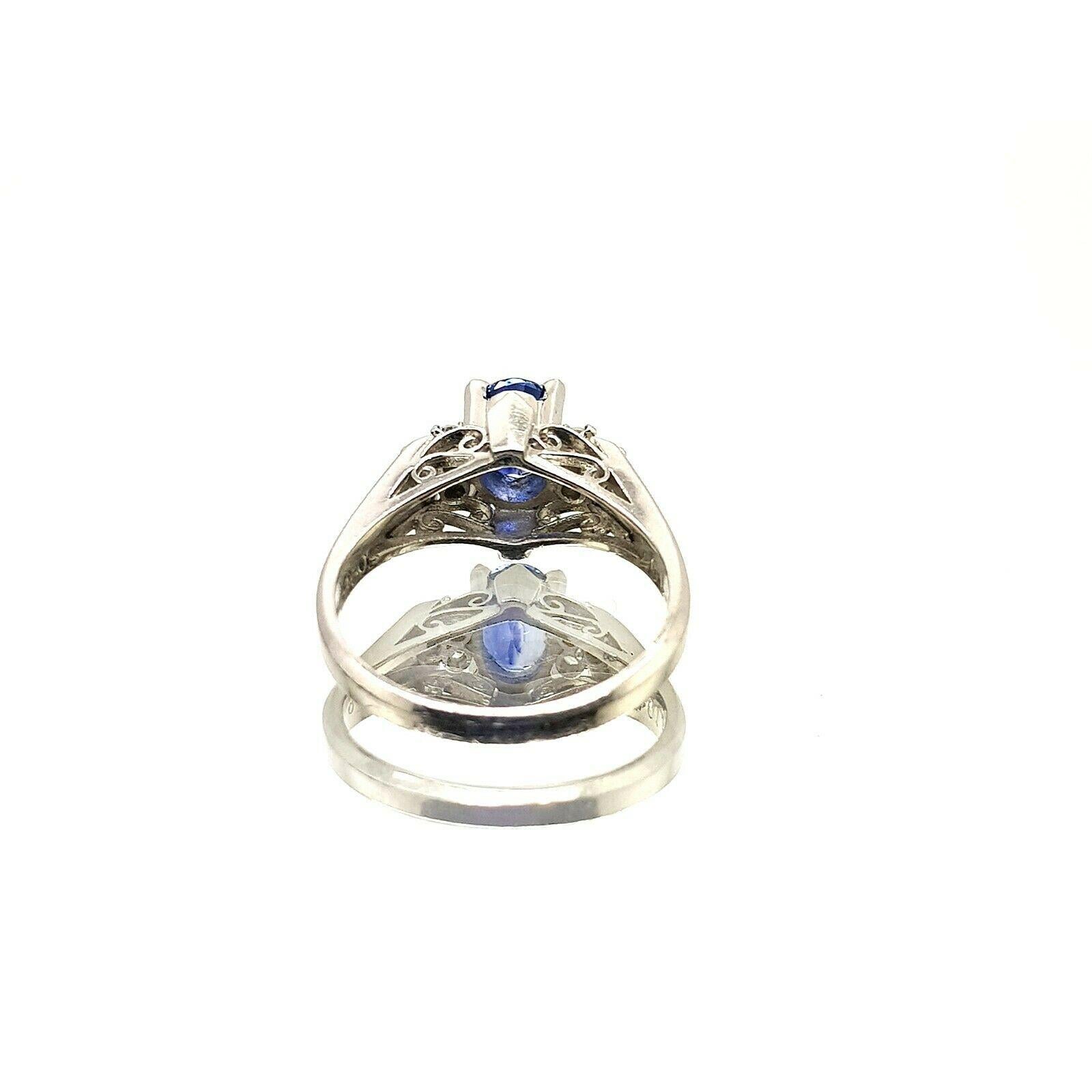  Specifications:
    main stone: BLUE SAPPHIRE  0.98 ct
    additional: ROUND AND BAGUETTE DIAMONDS
    diamonds: 6 PCS
    carat total weight: 0.13
    color: n/a
    clarity: n/a
    brand: custom
    metal: PLATINUM PT900
    type:
    weight: