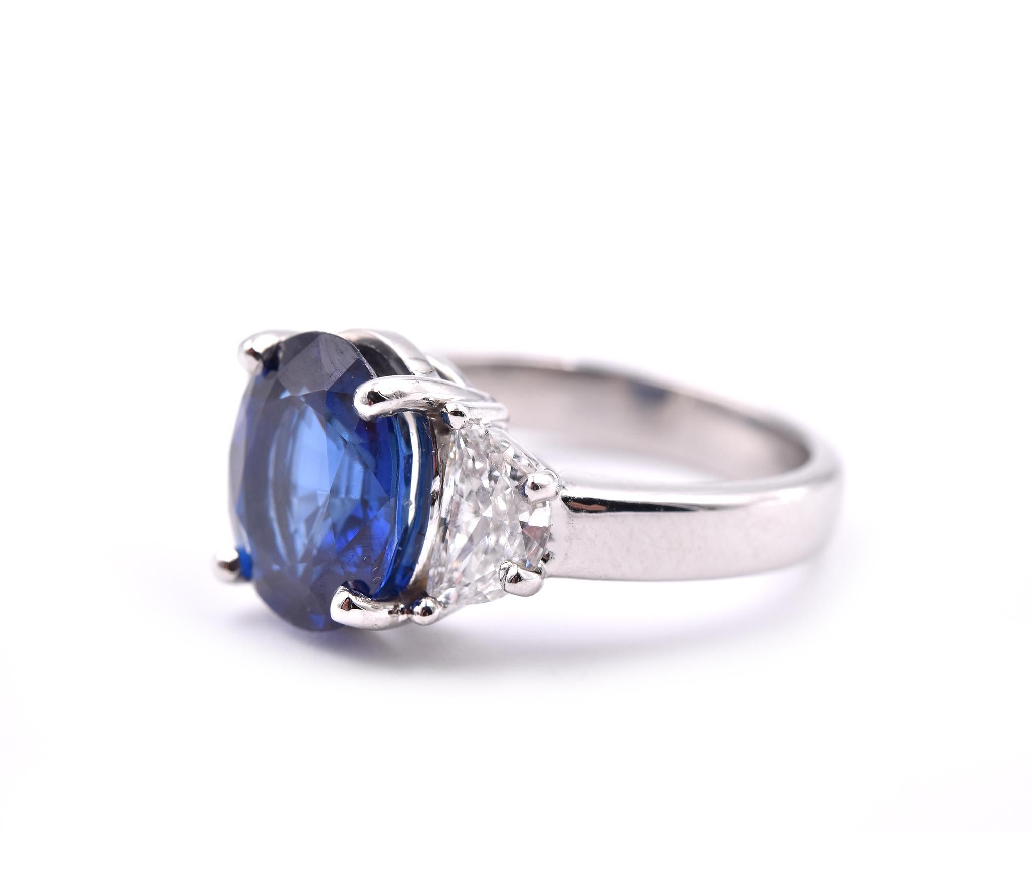 Oval Cut Platinum Sapphire and Diamond Ring