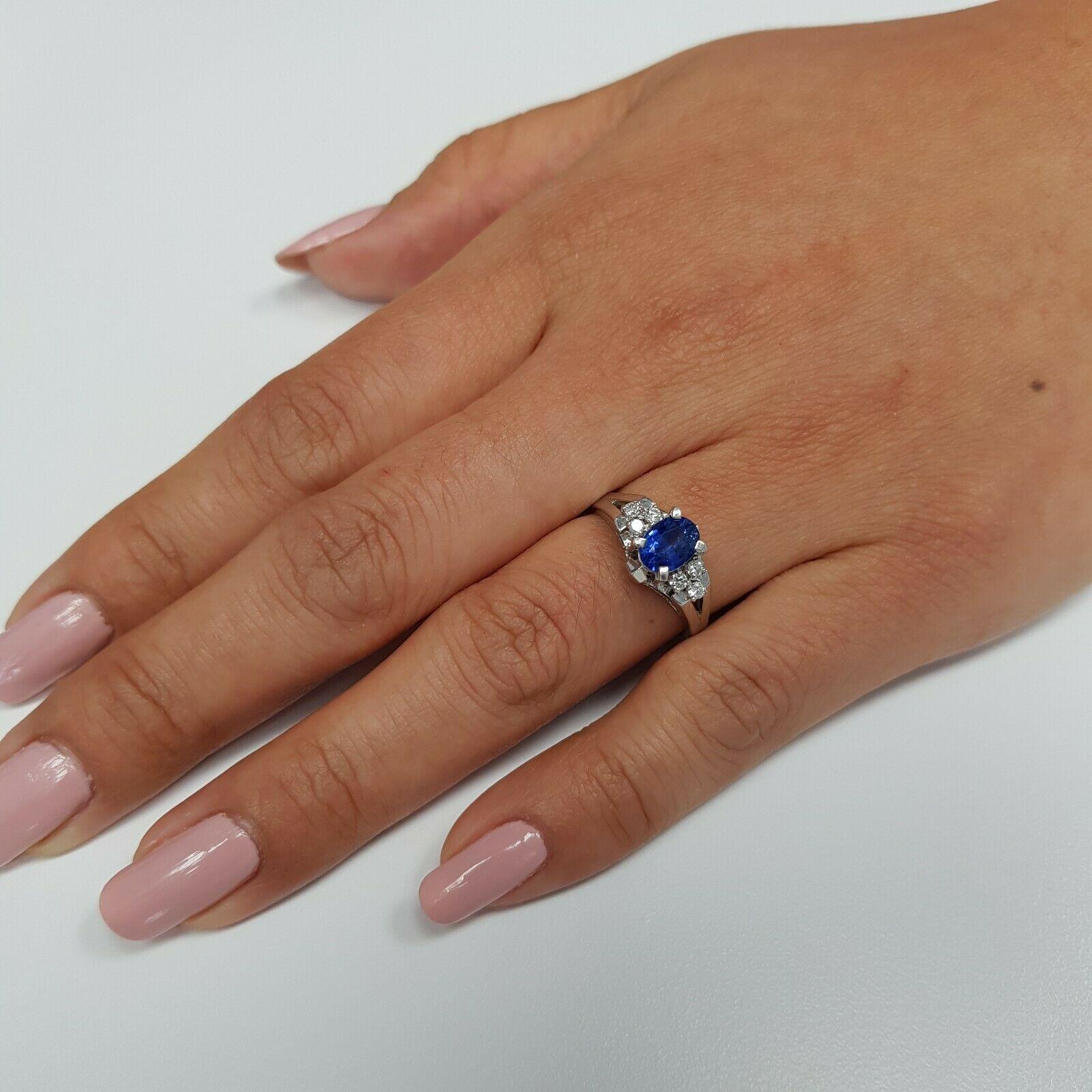 Oval Cut Platinum Sapphire and Diamond Ring
