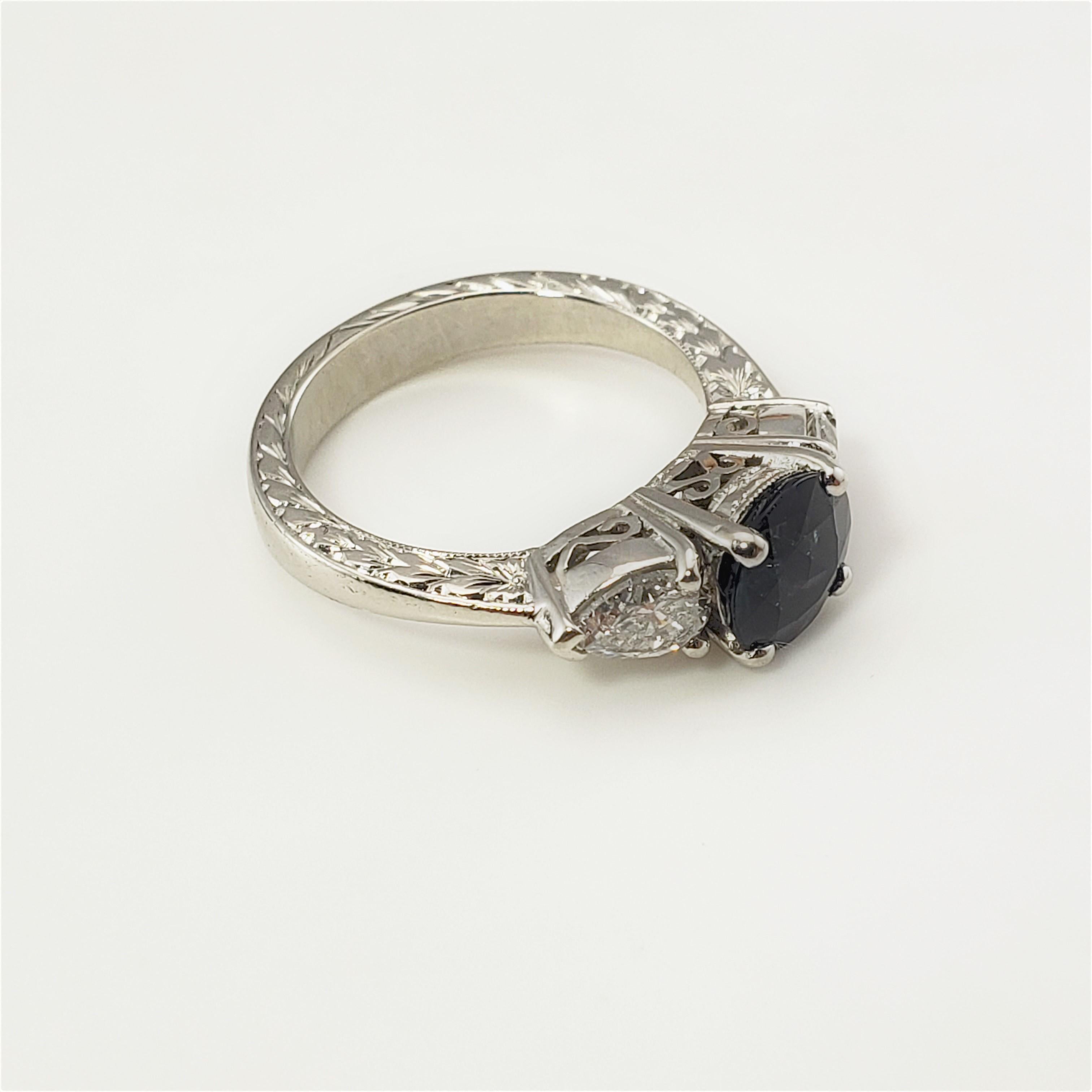 Pear Cut Platinum Sapphire and Diamond Ring 