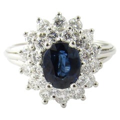Vintage Platinum Natural Sapphire and Diamond Halo Ring