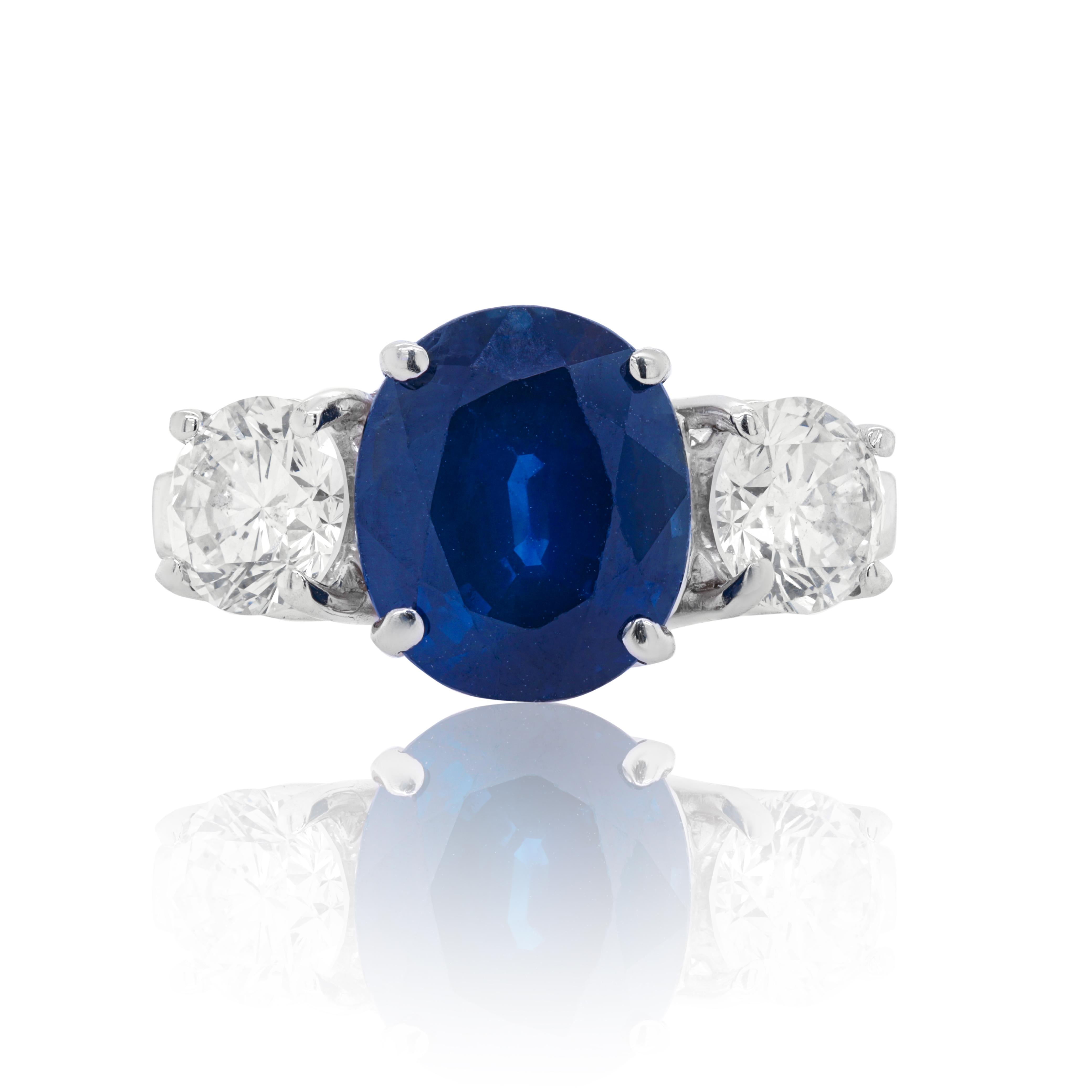 Platinum sapphire and diamond ring features 3.94 carat of sapphire as a center stone and 1.45 carat of diamonds
