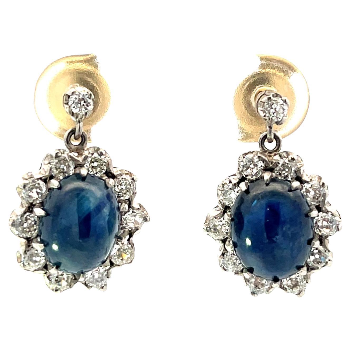 Orecchini in platino con zaffiro cabochon e diamante Rosetta