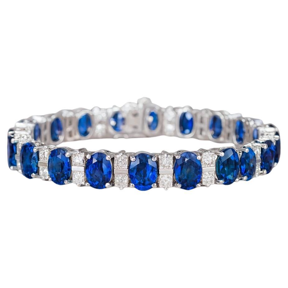 Bracciale tennis in platino con zaffiri e diamanti, 29 carati di zaffiri blu e 7,10 carati di diamanti VS2 Princess

Questo squisito bracciale personalizzato presenta 29 carati di zaffiri ovali di colore blu intenso, perfettamente integrati da 7,10