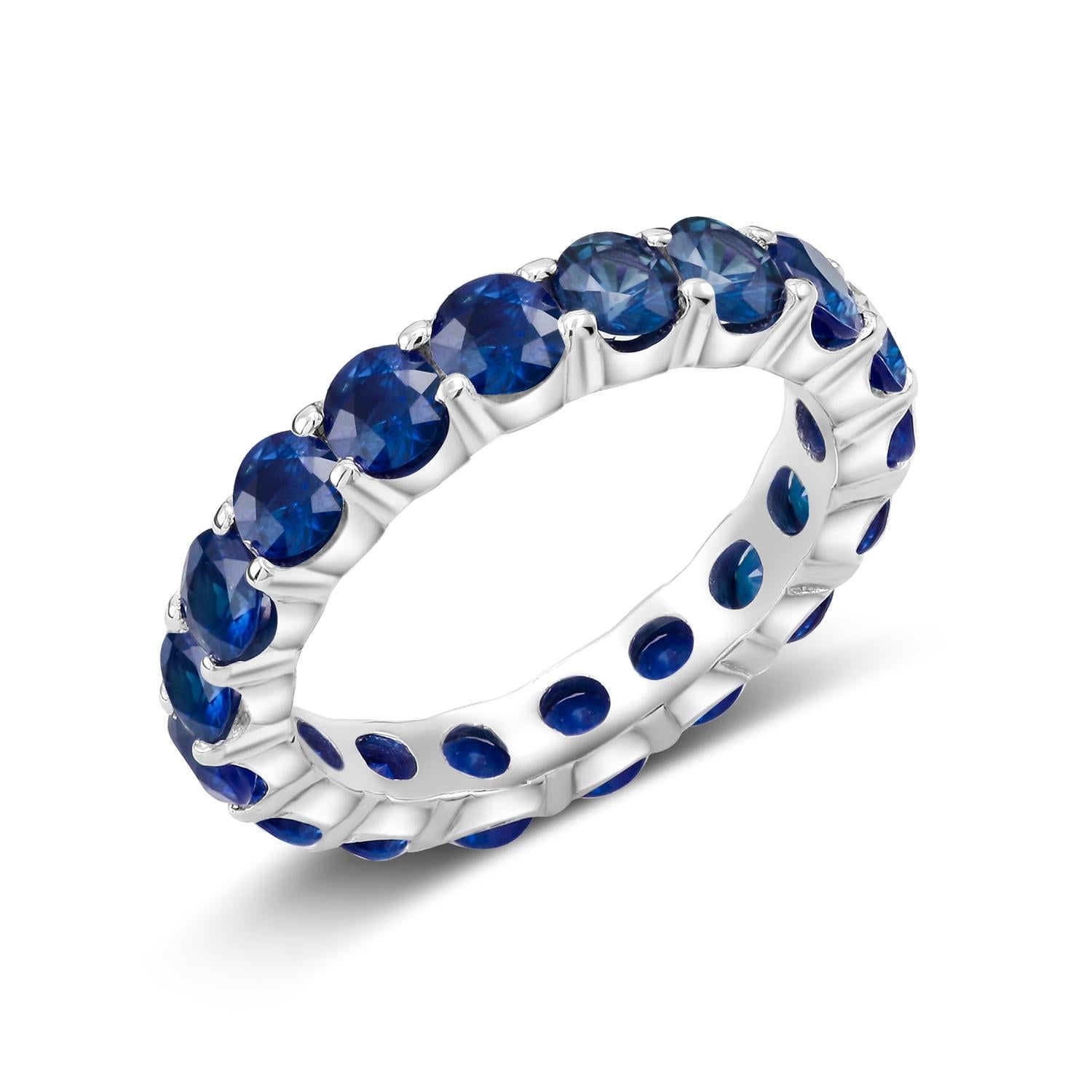 Platinum Sapphire Prong Set Eternity Ring Weighing 4.50 Carat In New Condition In New York, NY