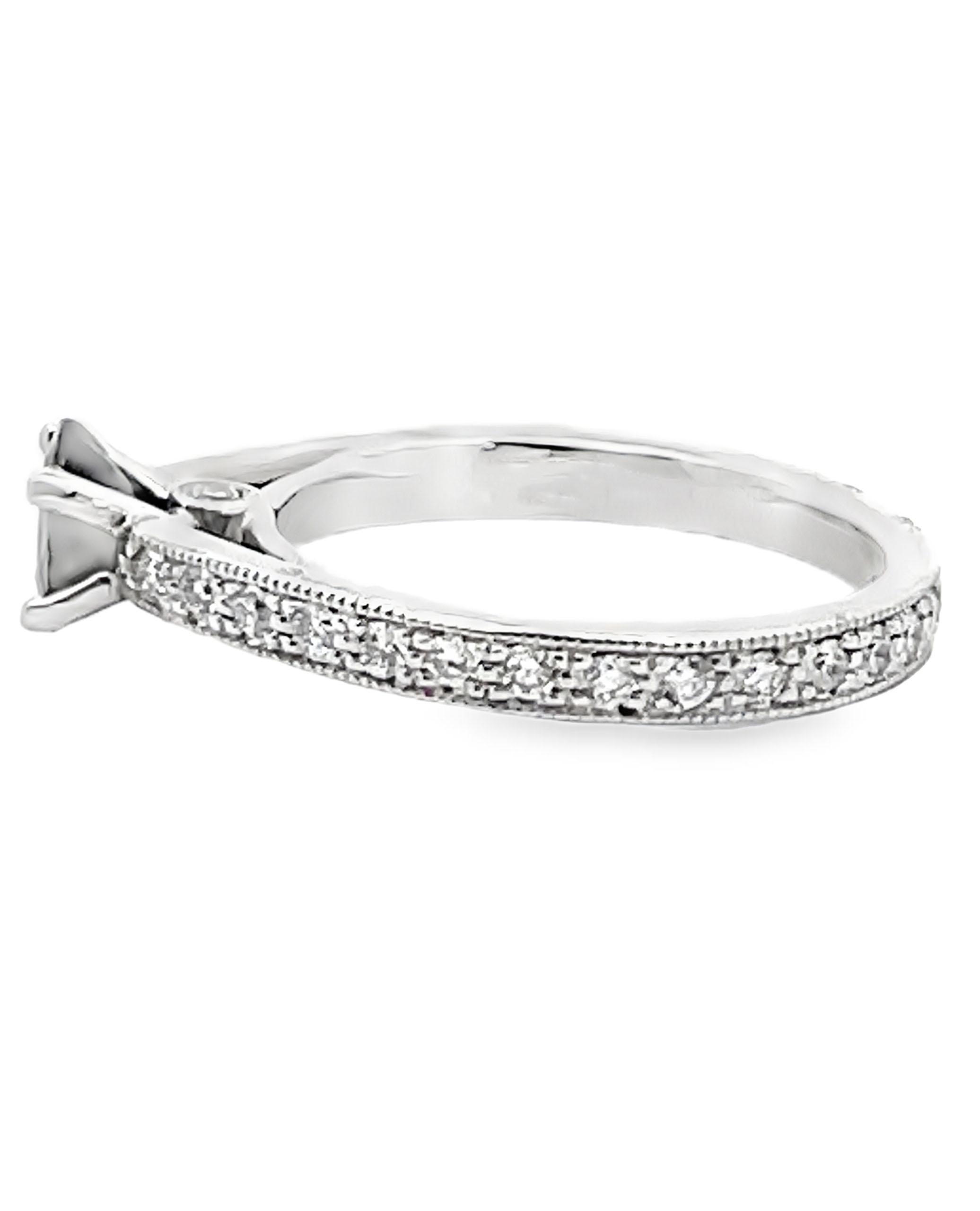 Platinum Scott Kay solitaire ring with round diamonds weighing 0.48 carat total and one center oval shaped dark blue sapphire weighing 0.72 carat.

- Finger size 6.5
- Sapphire measures at 6.14 x 5.00 mm