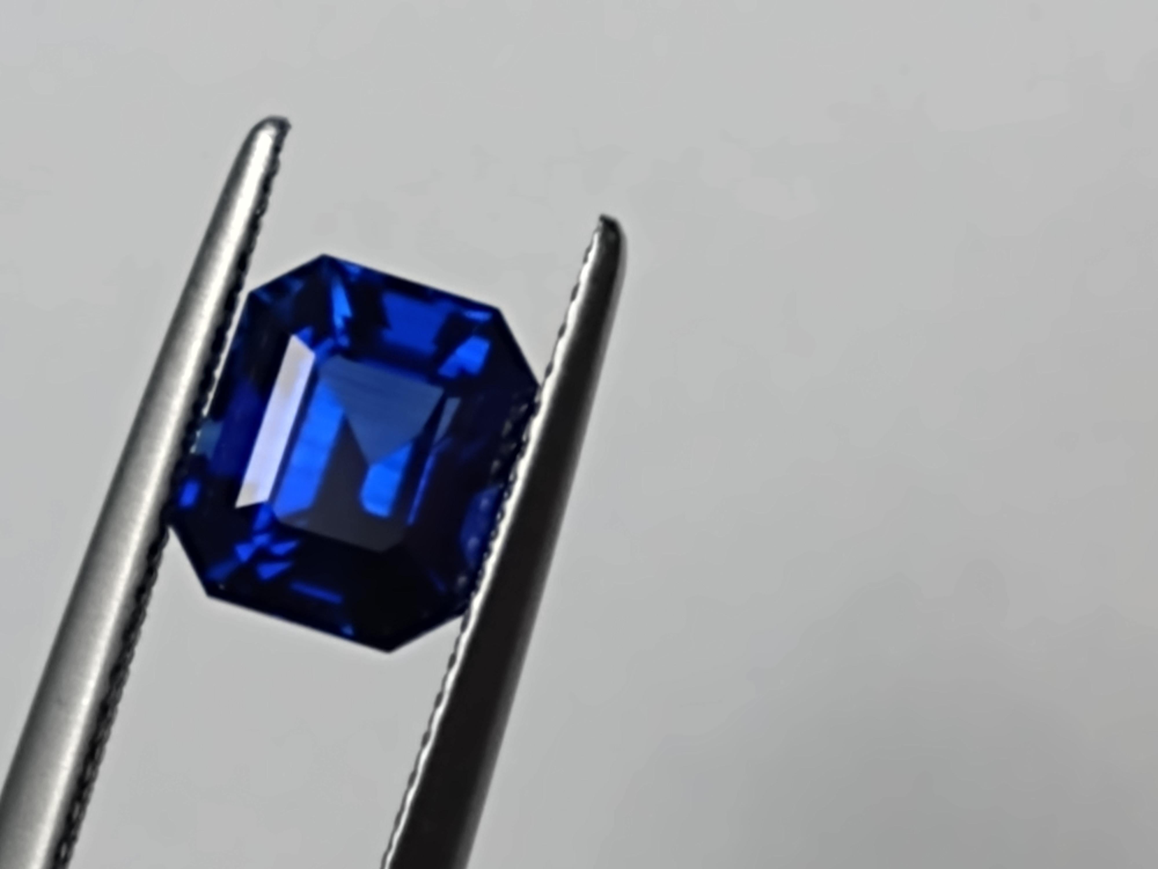 For Sale:  Platinum Sculpture Unisex Ring with 2.48 Carat Emerald Cut Blue Sapphire 11