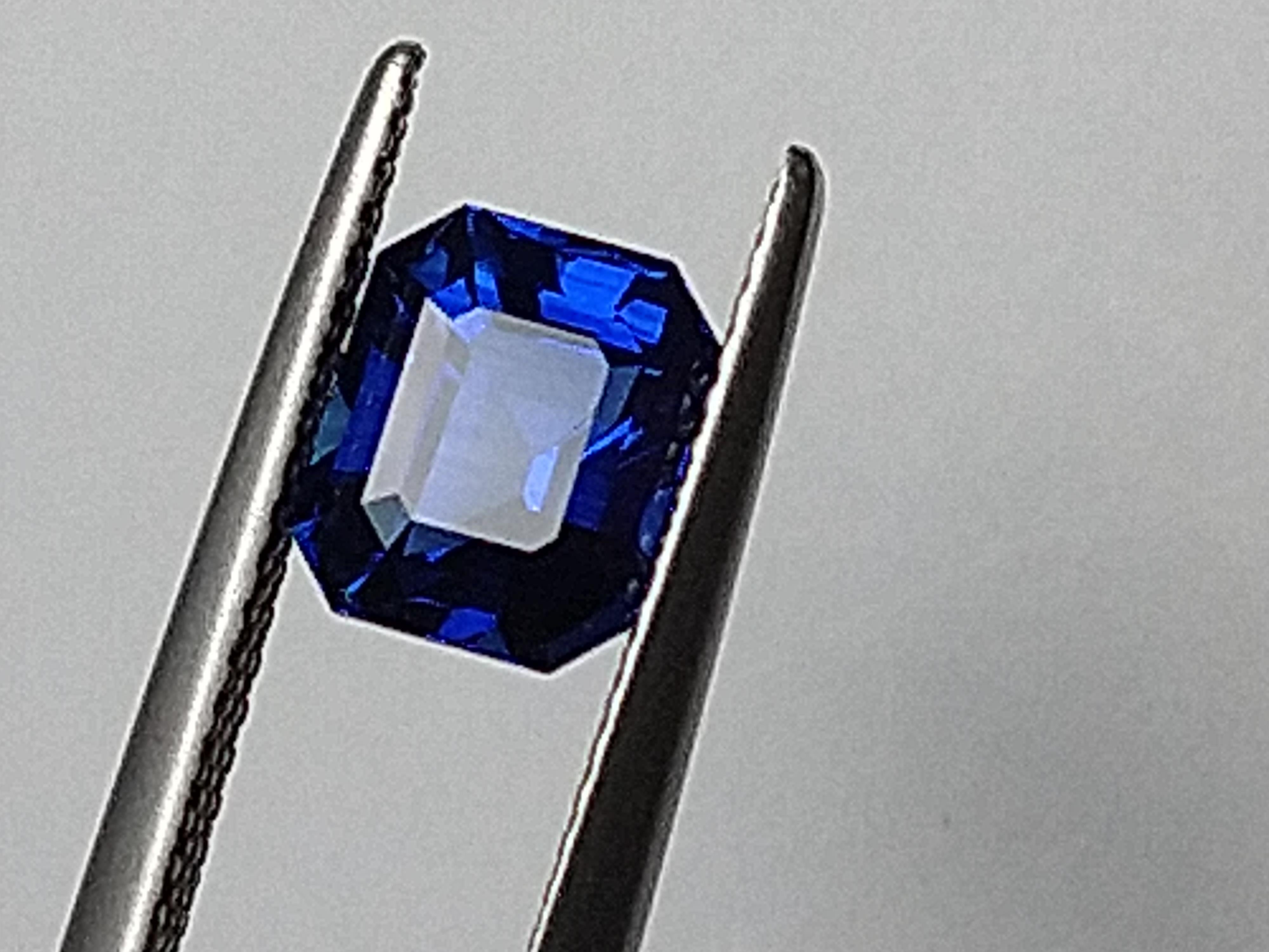 For Sale:  Platinum Sculpture Unisex Ring with 2.48 Carat Emerald Cut Blue Sapphire 5