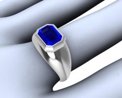 Platinum Sculpture Unisex Ring with 2.54 Carat Emerald Cut Blue Sapphire