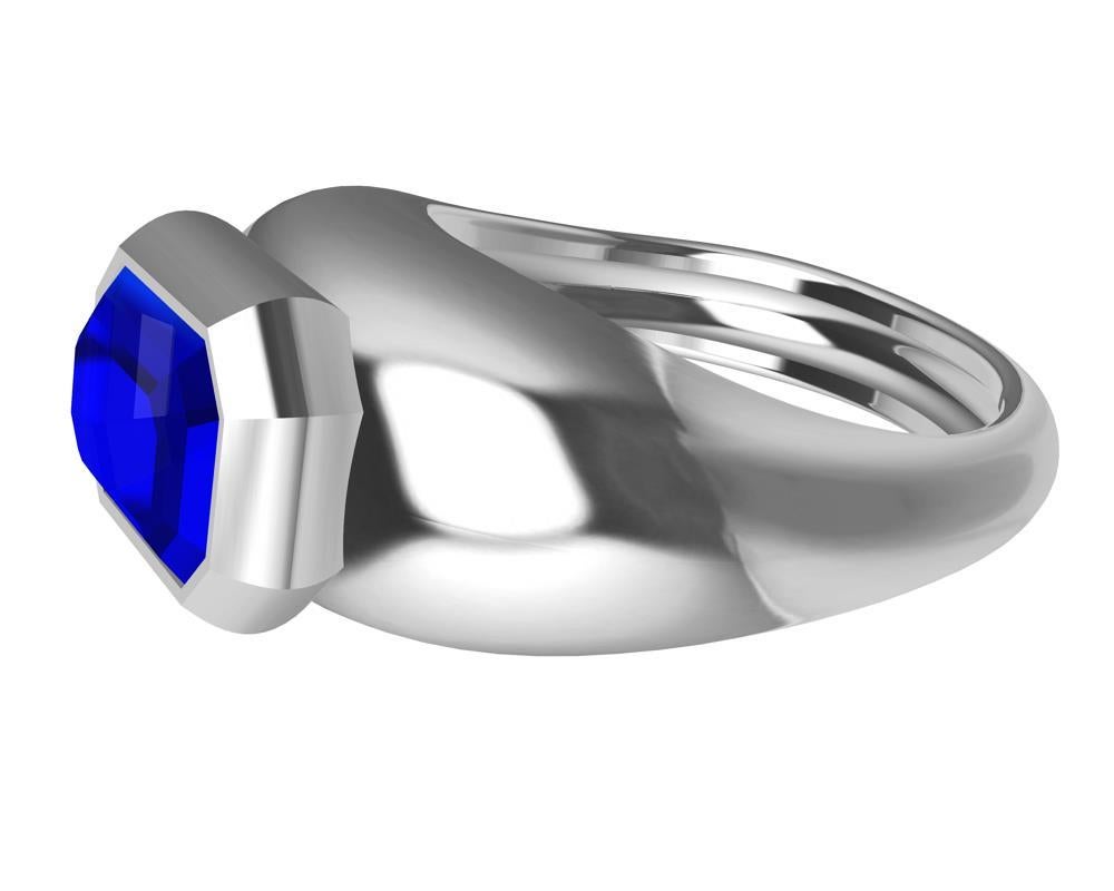 For Sale:  Platinum Sculpture Unisex Ring with 2.54 Carat Emerald Cut Blue Sapphire 7