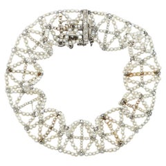Bracciale in platino con intreccio di perle di semi
