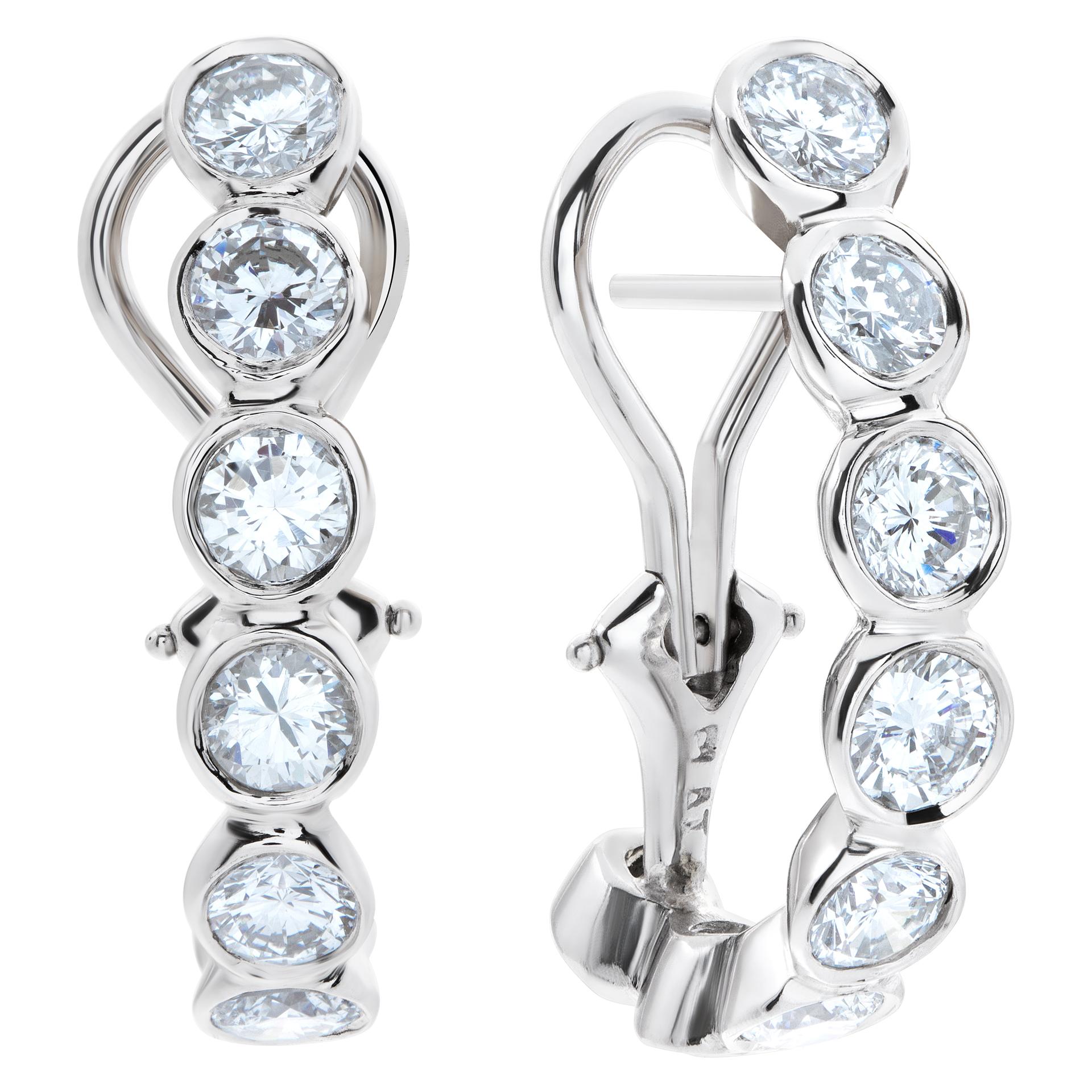 Platinum semi-hoop earrings with 3.75 carats in round G-H color, VS-SI clarity diamonds. Drop length 1'', width 5mm.