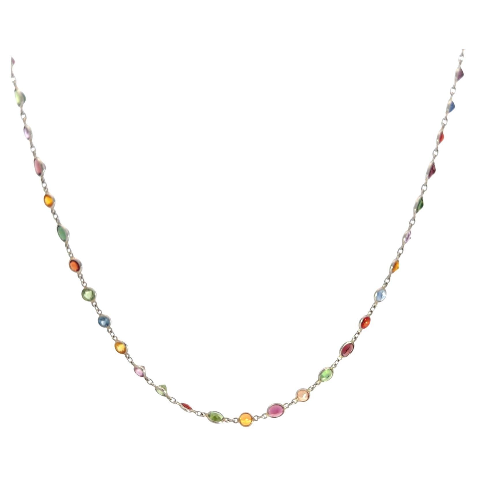 Collana di platino con pietre semipreziose