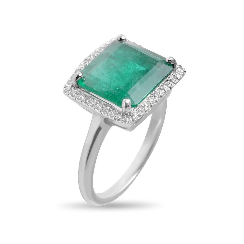 Modern Platinum Emerald Ring with Diamond Halo For Sale
