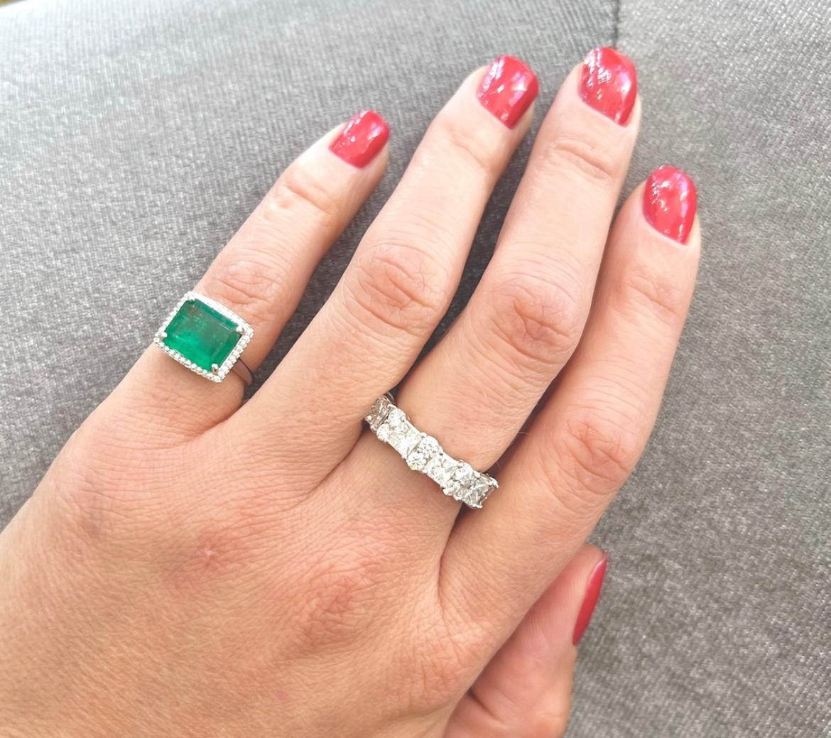 Square Cut Platinum Emerald Ring with Diamond Halo For Sale
