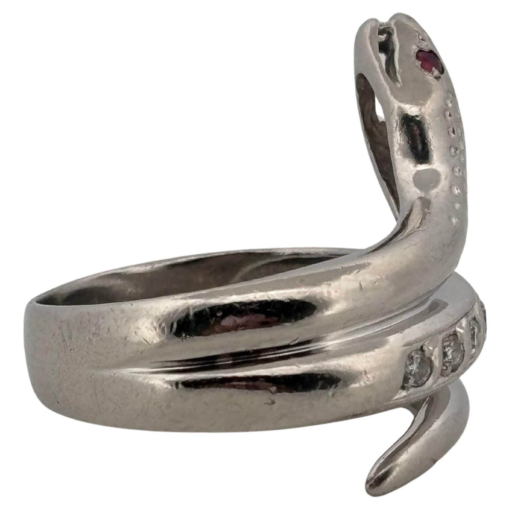 Taille ronde Bague serpent en platine 0,12 ct de diamant et 0,02 ct de rubis en vente