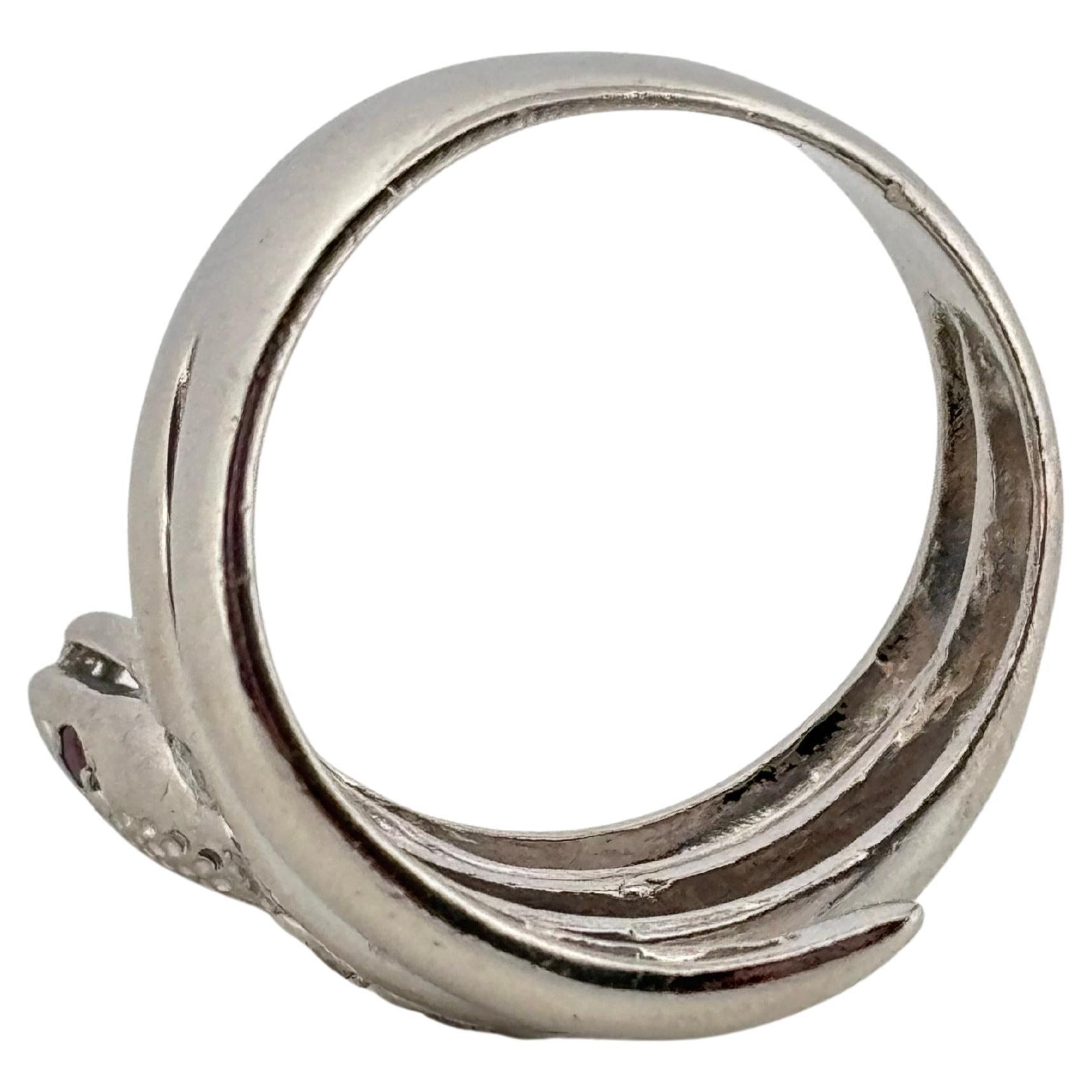 Bague serpent en platine 0,12 ct de diamant et 0,02 ct de rubis en vente 1