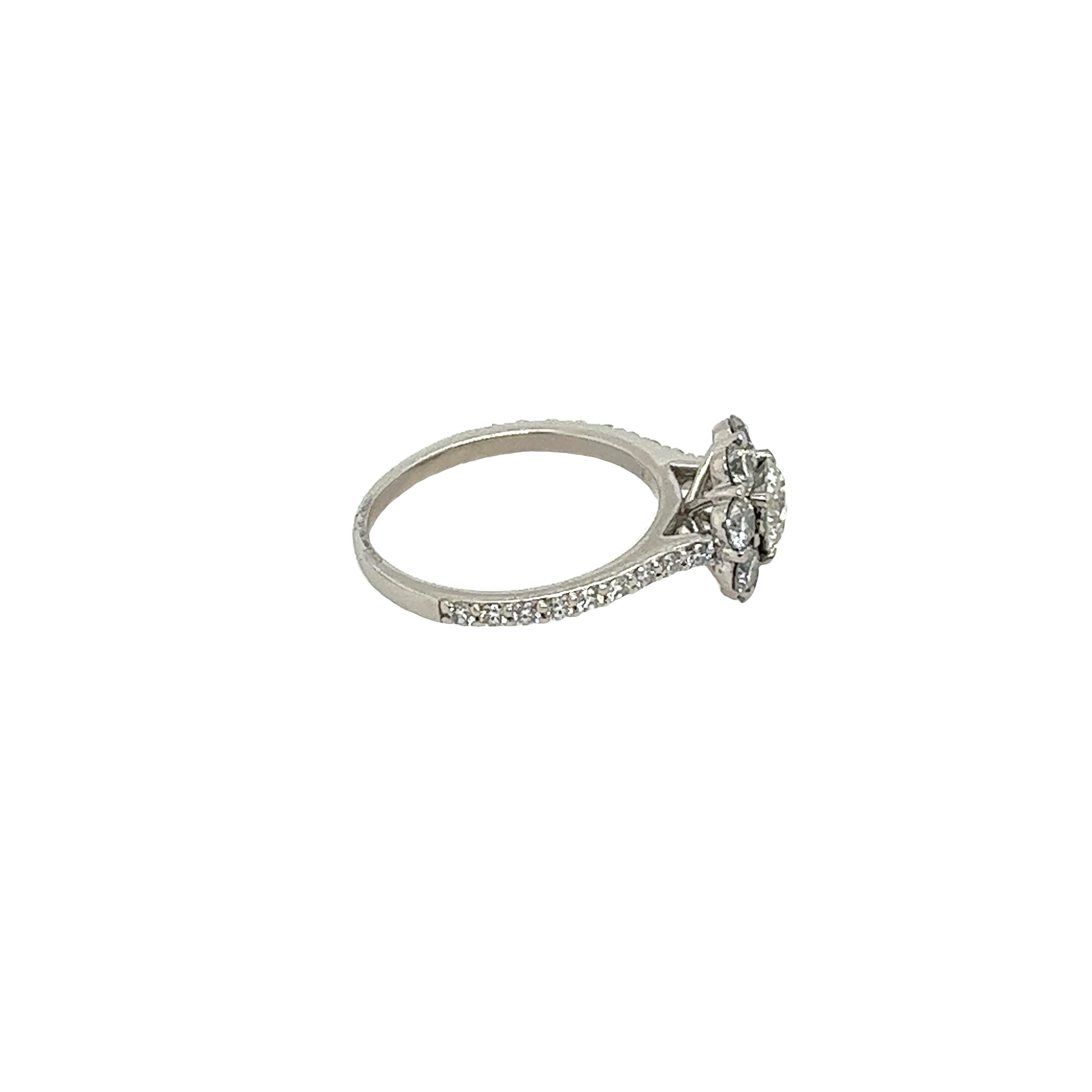 Platinum Solitaire Cluster Ring Set With GIA 0.70ct H/SI2 centre Diamond In Excellent Condition In London, GB