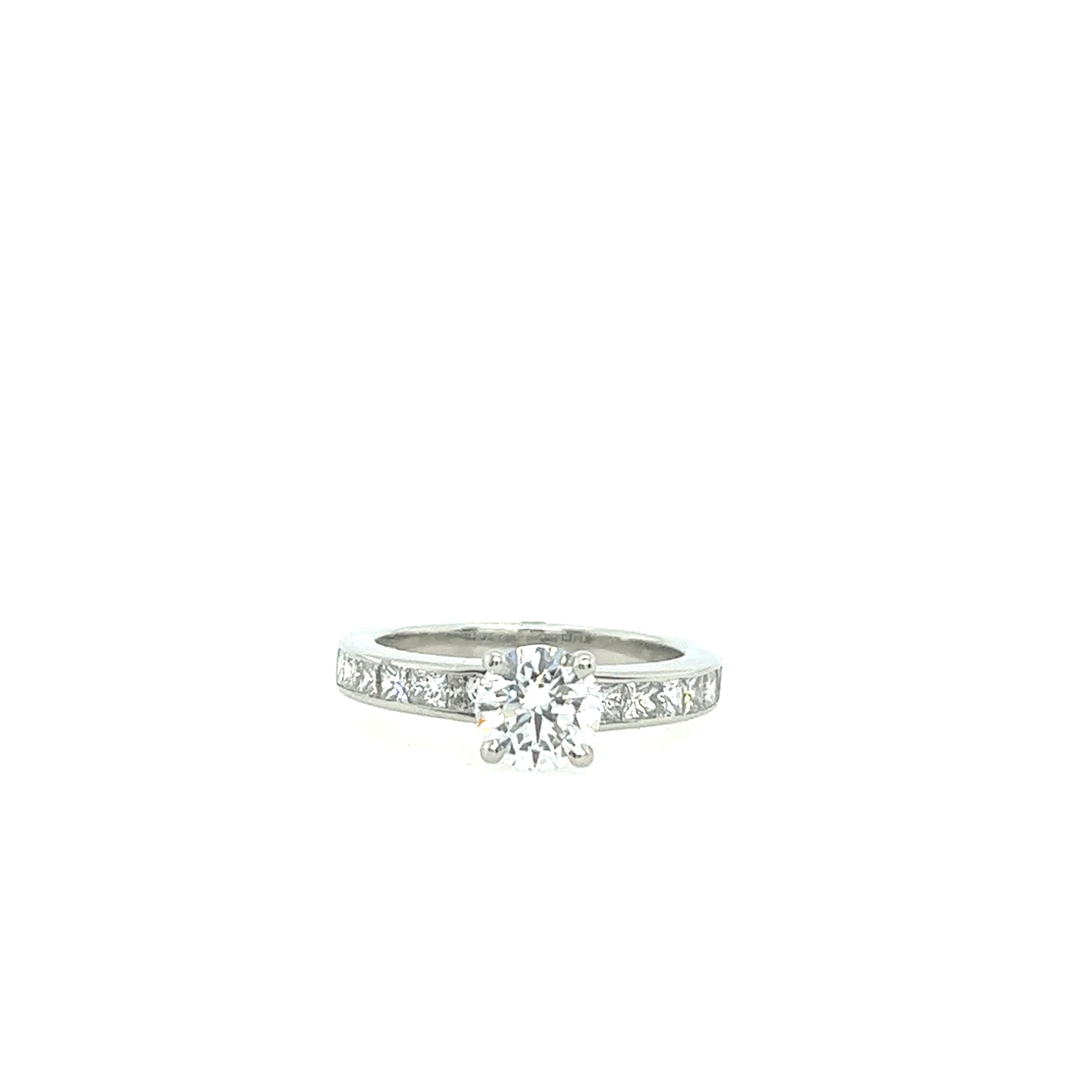 Women's Platinum solitaire Diamond Ring 0.70ct E Colour, with 12 diamonds on shoulders