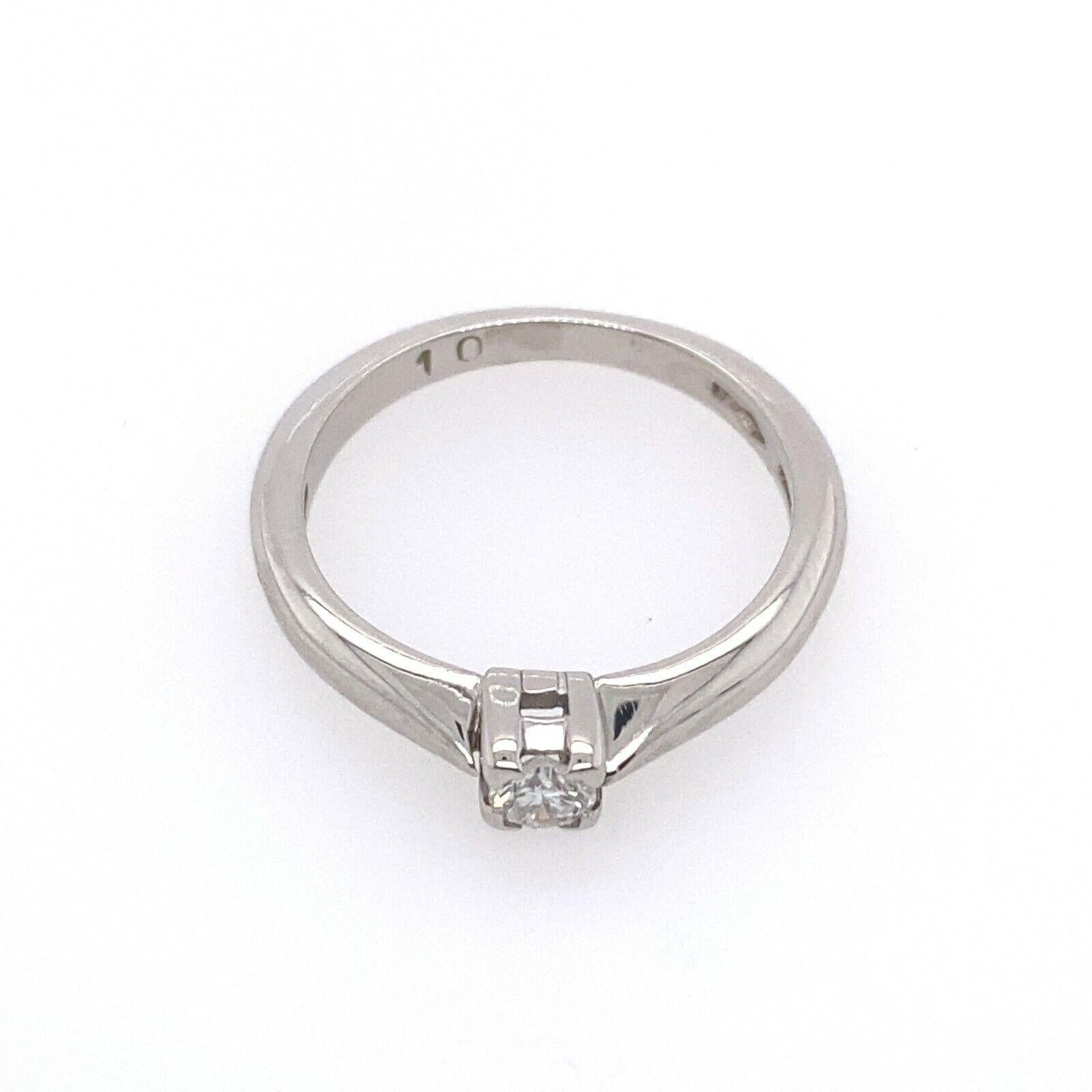 Platinum Solitaire Diamond Ring Set With a 0.10ct Round Brilliant Diamond

Additional Information:
Total Diamond Weight: 0.10ct
Diamond Colour: G/H
Diamond Clarity: SI
Total Weight: 3.2g
Ring Size: H
Width of Band: 2.2mm
Width of Head: 3.2mm
Length
